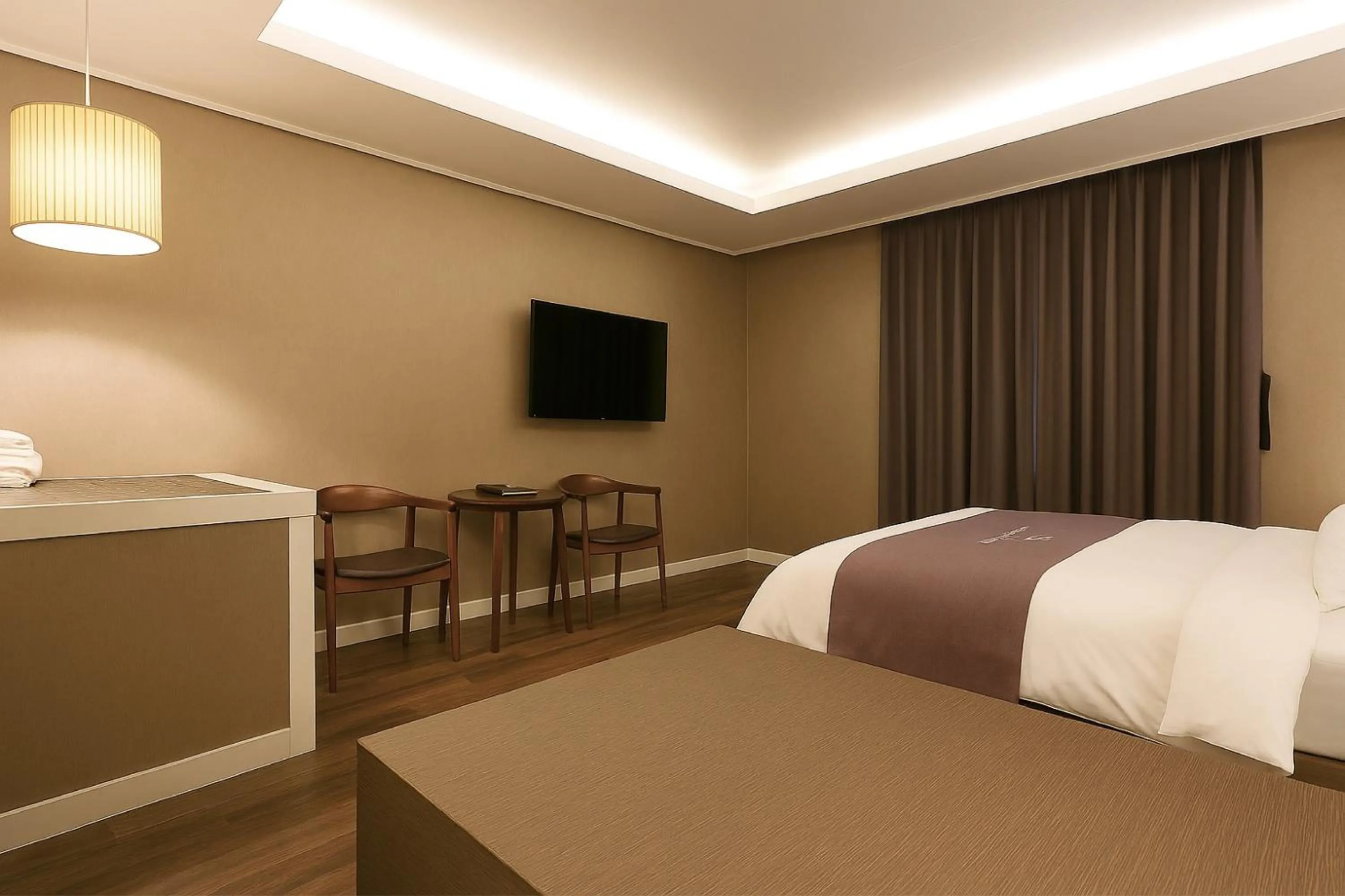 Bed in Seosan Modern Hotel