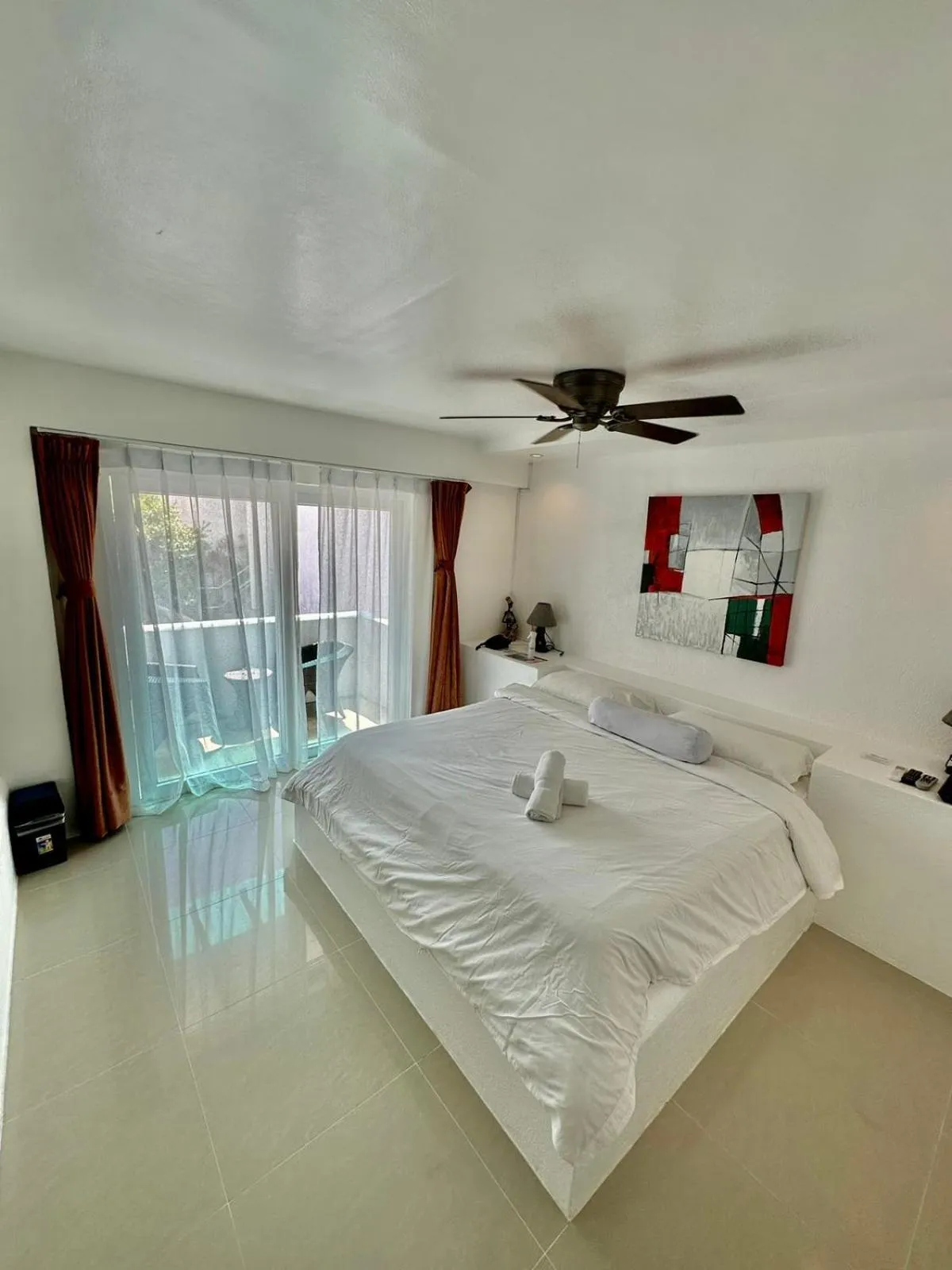 Bed in Calypso Beach and Dive Resort