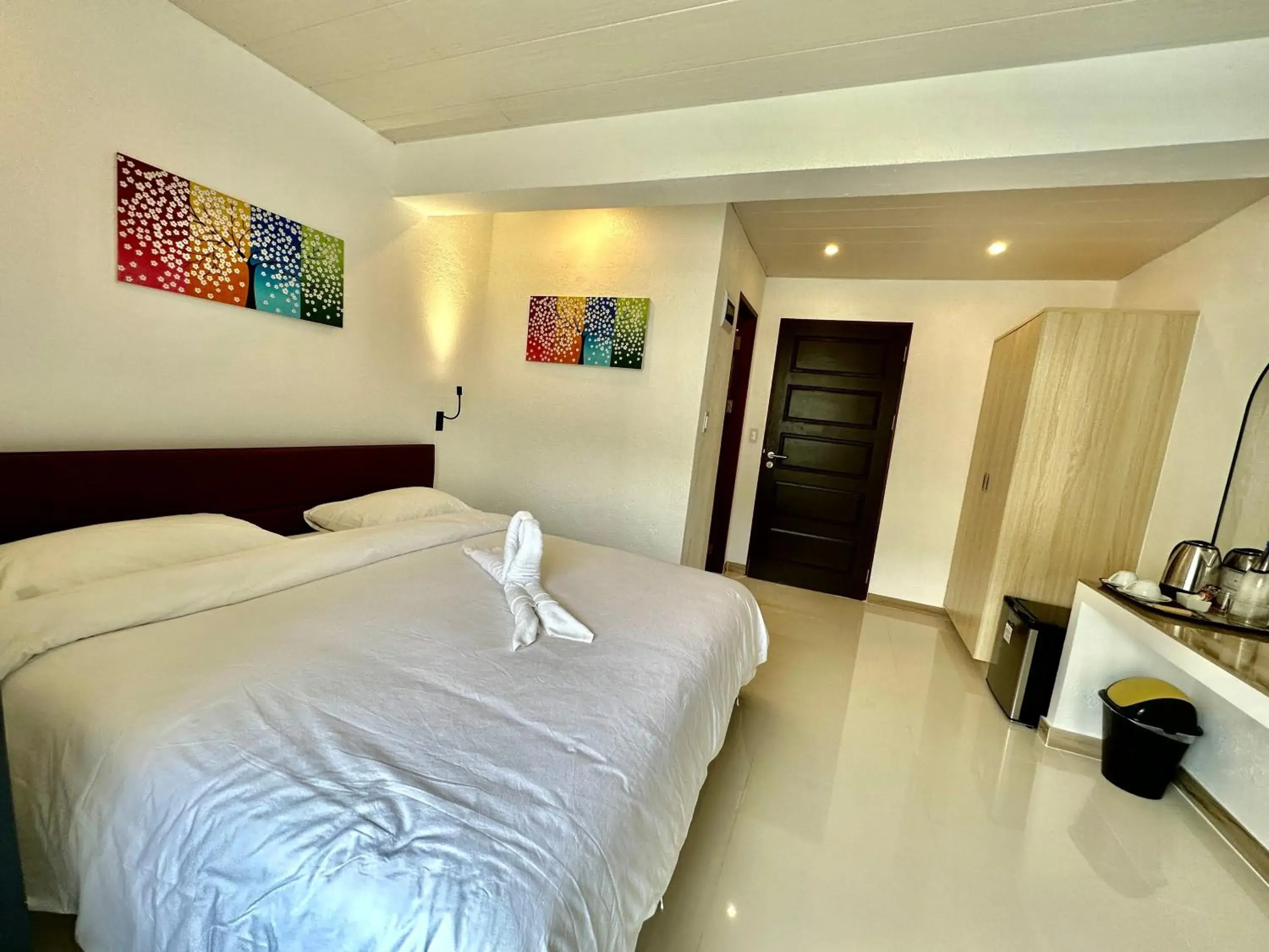 Bedroom, Bed in Calypso Beach and Dive Resort Bedroom, Bed in Calypso Beach and Dive Resort