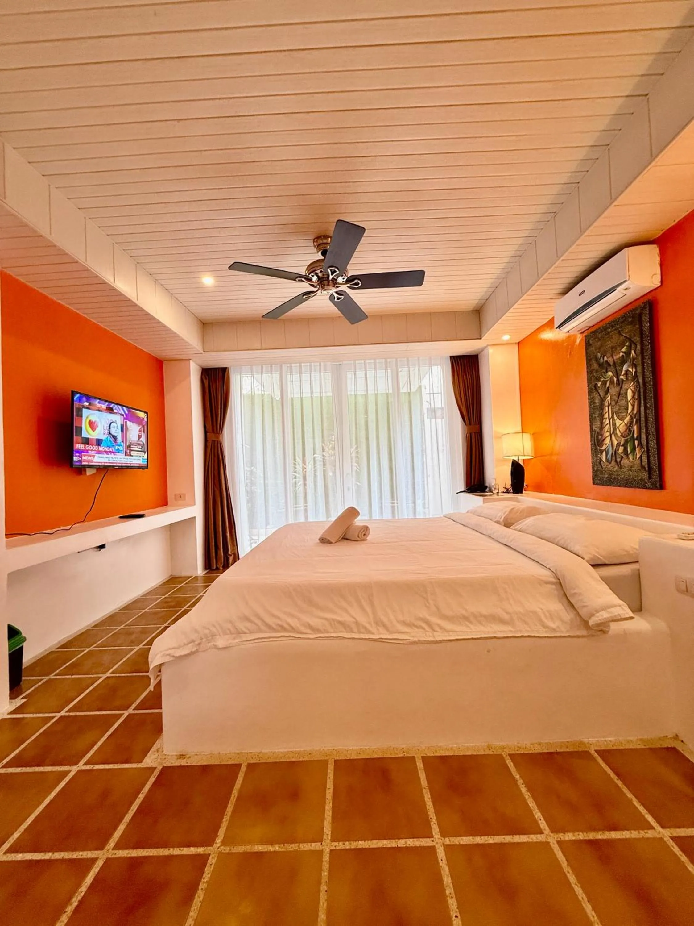 Bed in Calypso Beach and Dive Resort