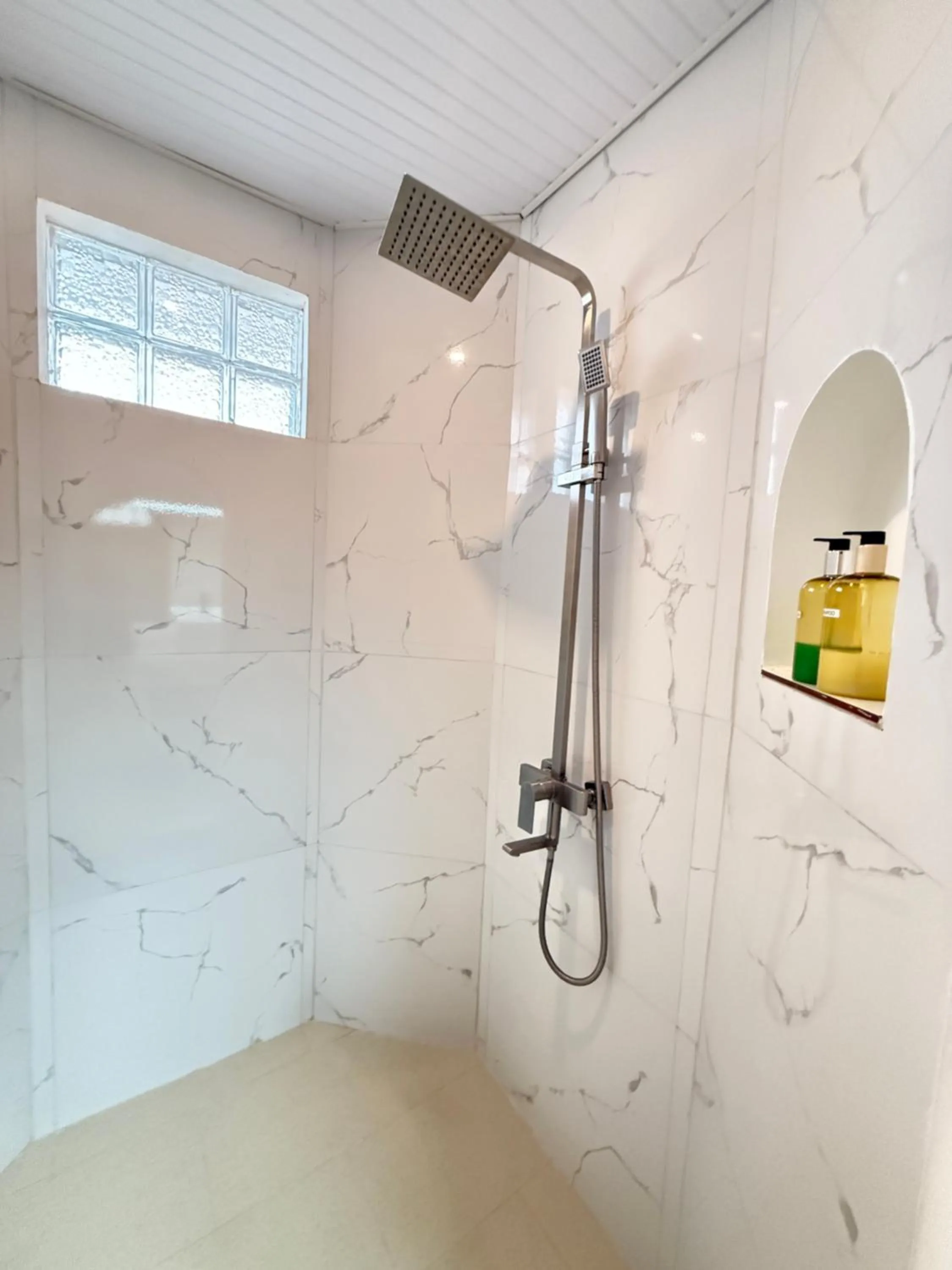 Bathroom in Calypso Beach and Dive Resort