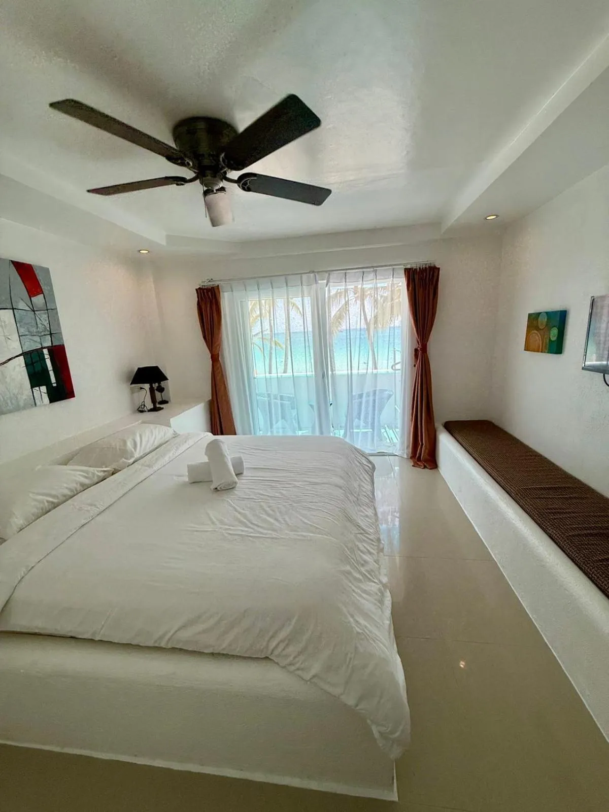 Bed in Calypso Beach and Dive Resort