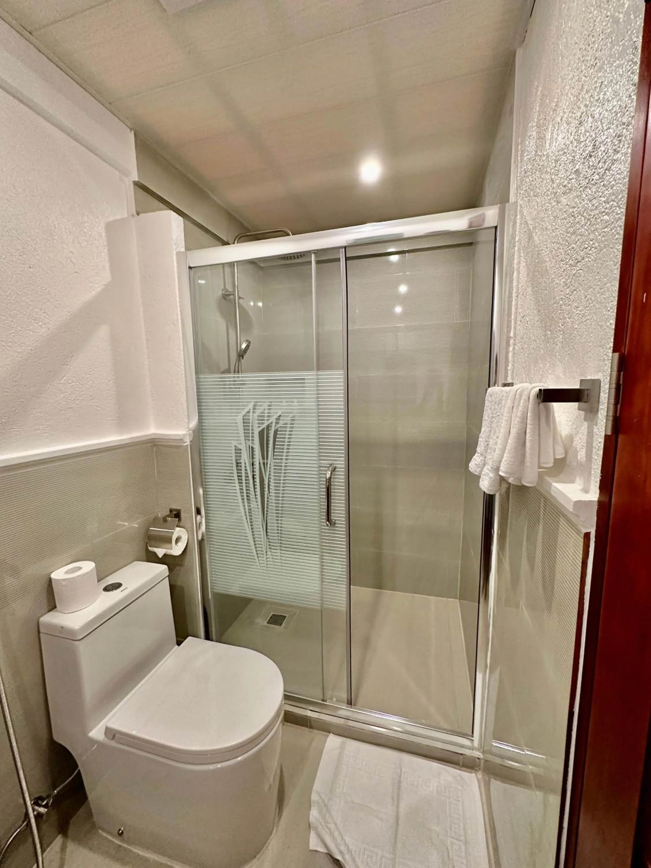 Bathroom in Calypso Beach and Dive Resort