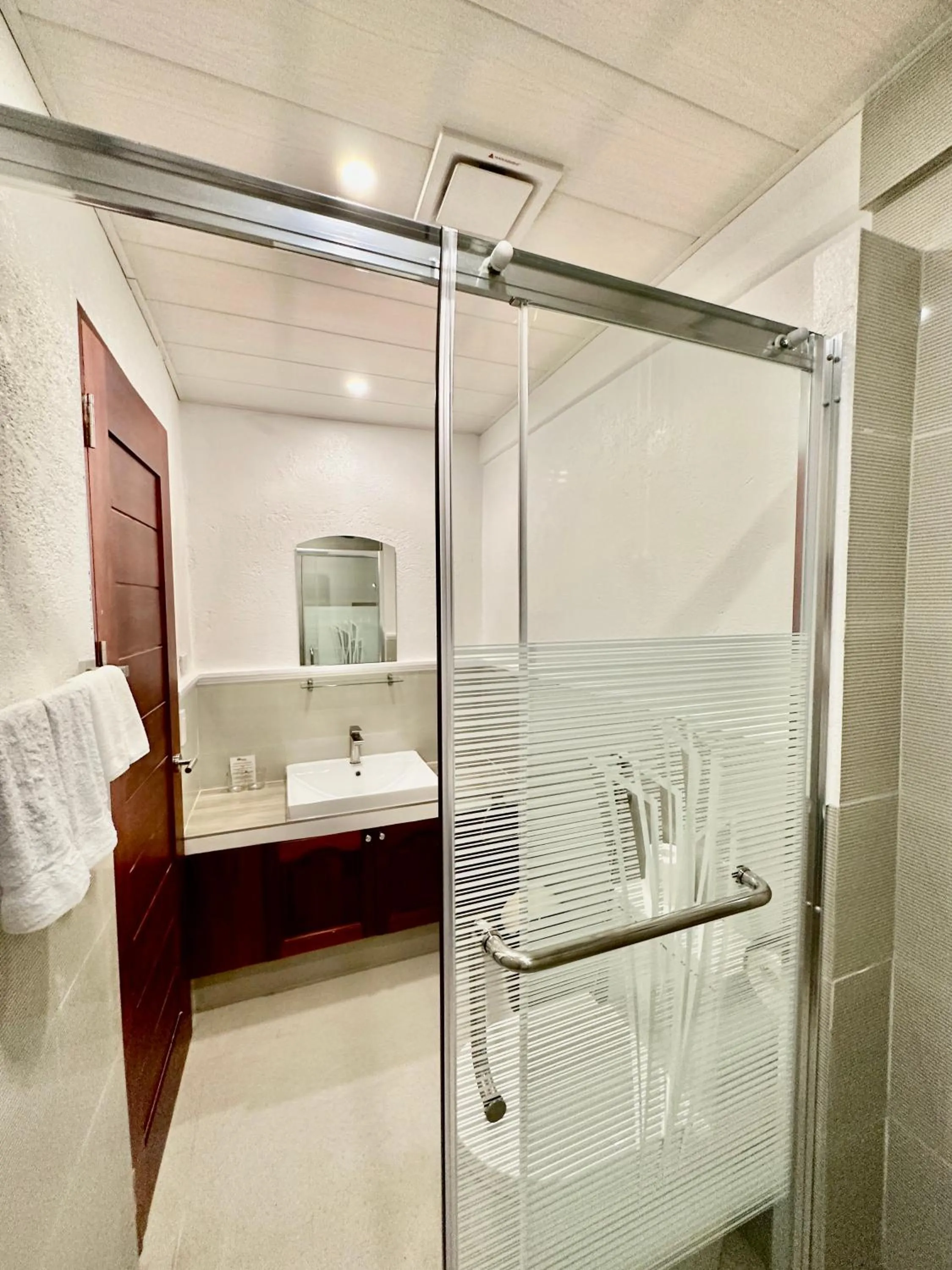 Bathroom in Calypso Beach and Dive Resort