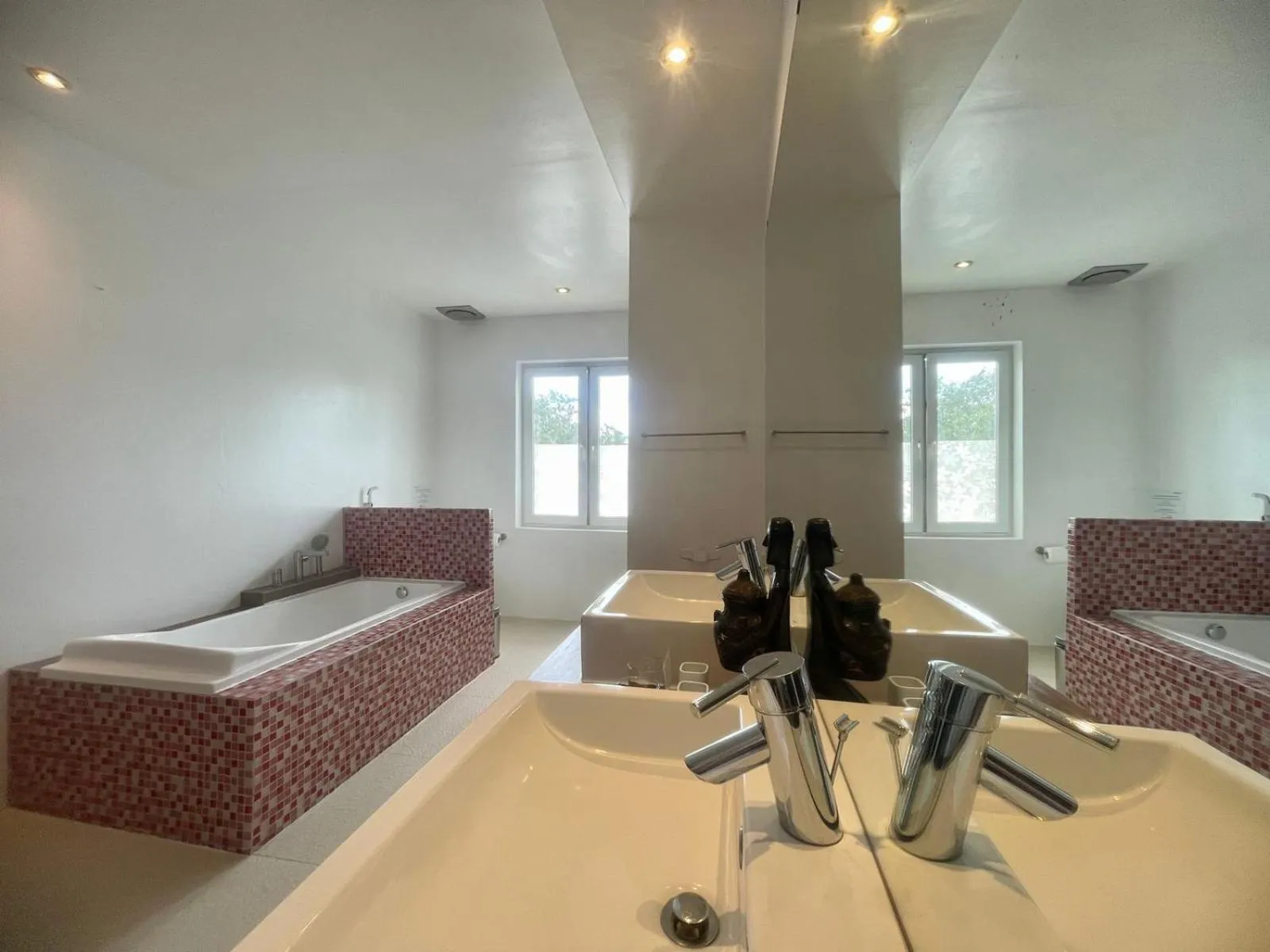 Bathroom, Bed in Calypso Beach and Dive Resort