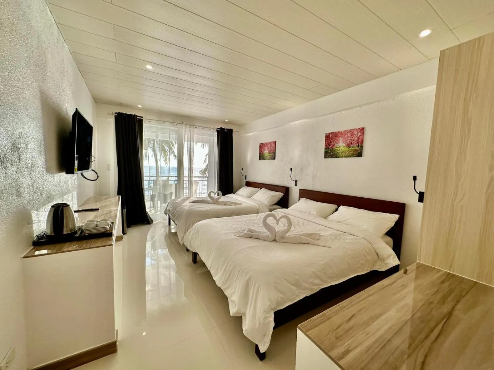 Bed in Calypso Beach and Dive Resort