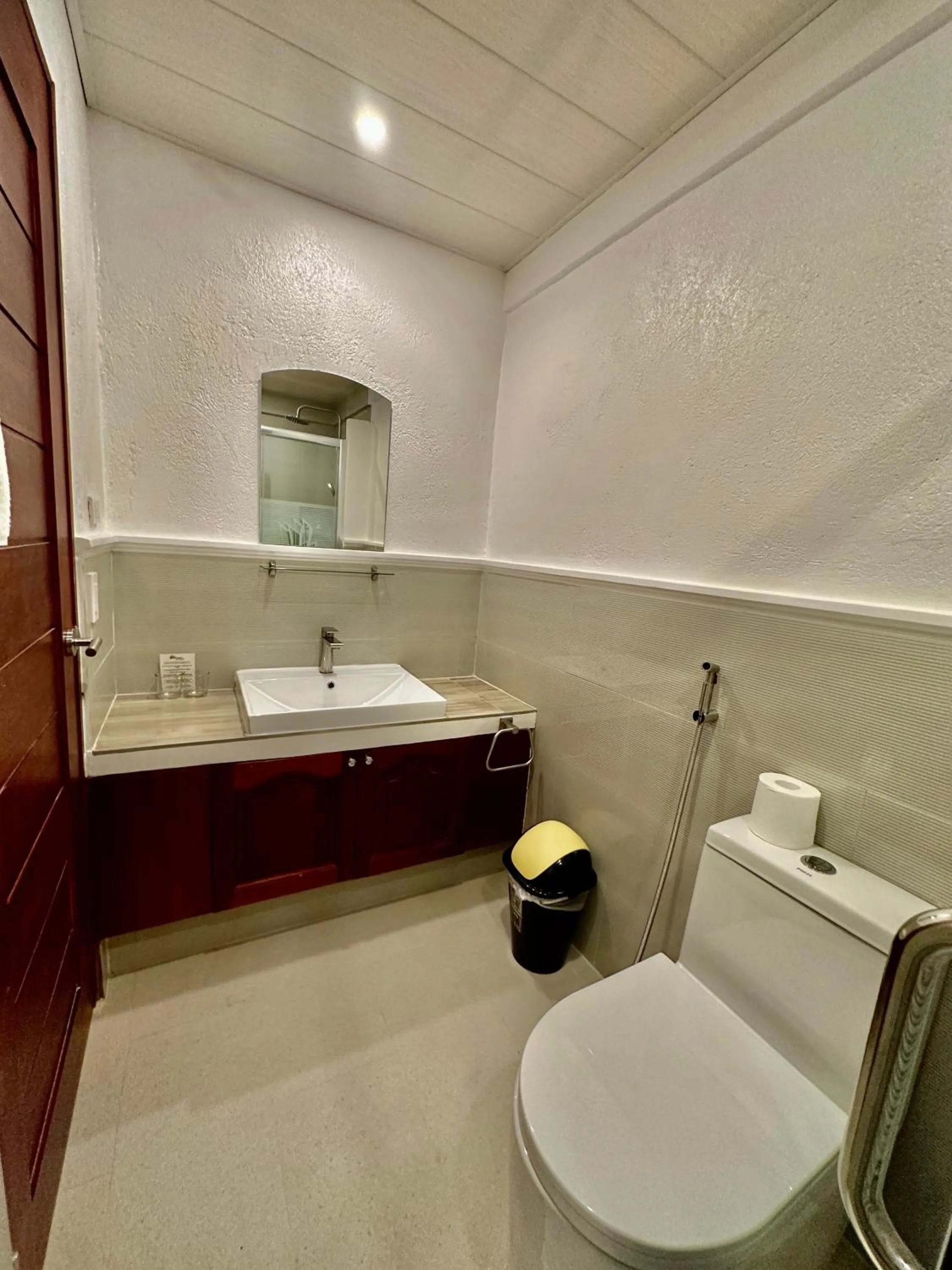 Bathroom in Calypso Beach and Dive Resort