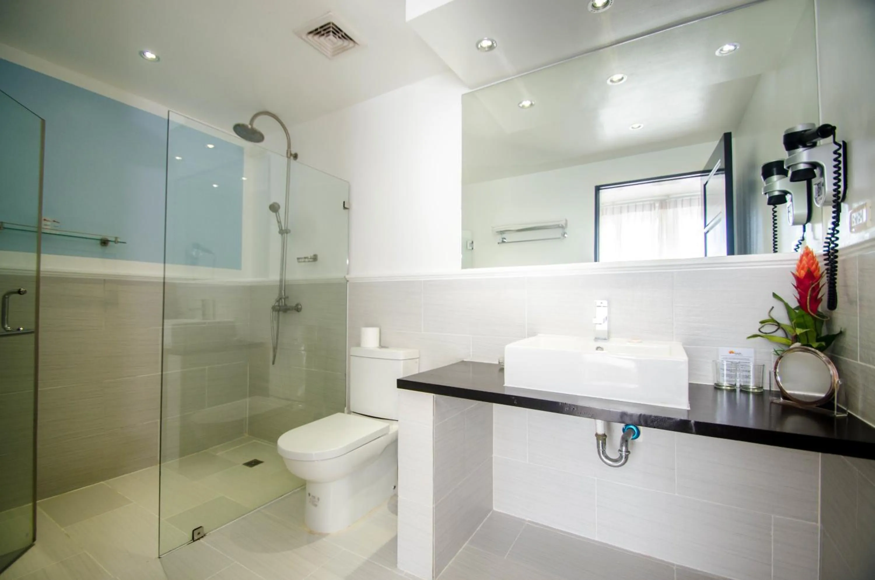 Bathroom in Calypso Beach and Dive Resort