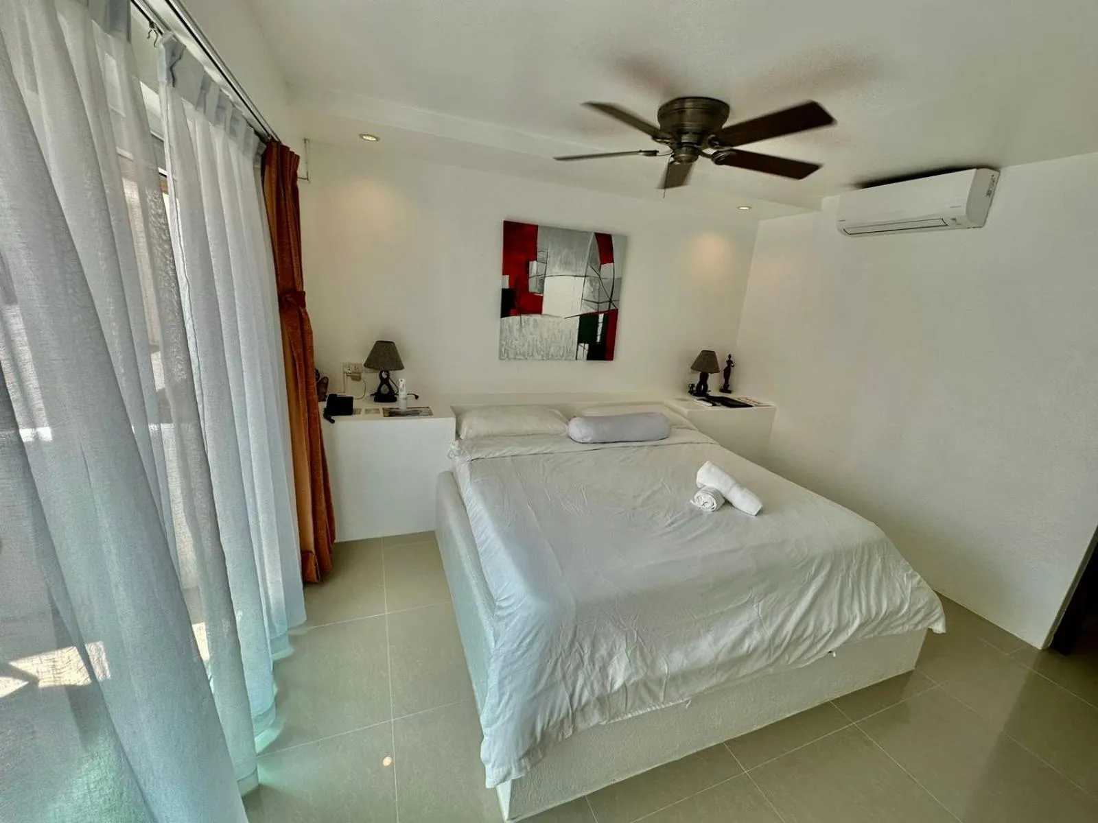 Bed in Calypso Beach and Dive Resort