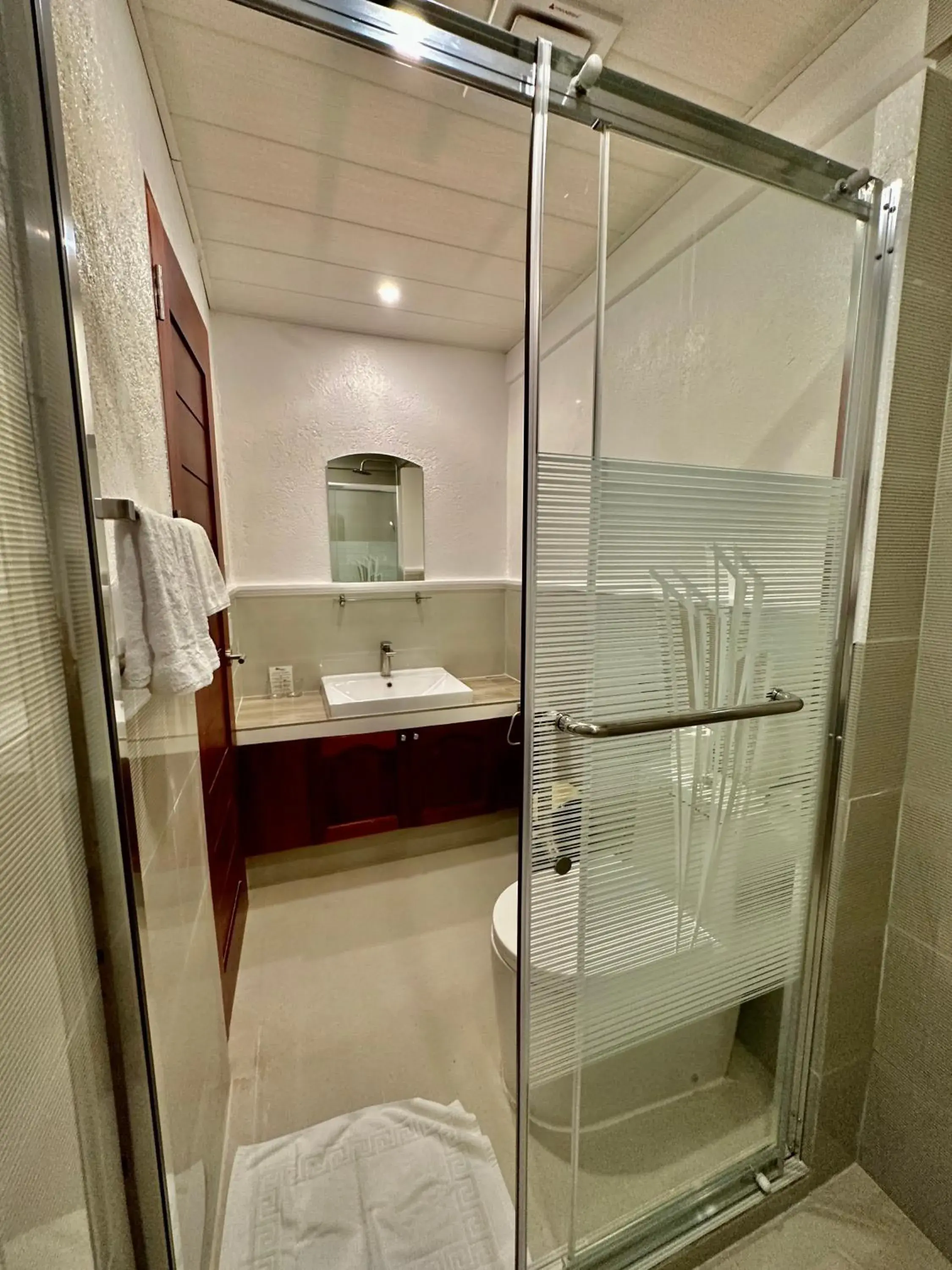 Bathroom in Calypso Beach and Dive Resort Bathroom in Calypso Beach and Dive Resort