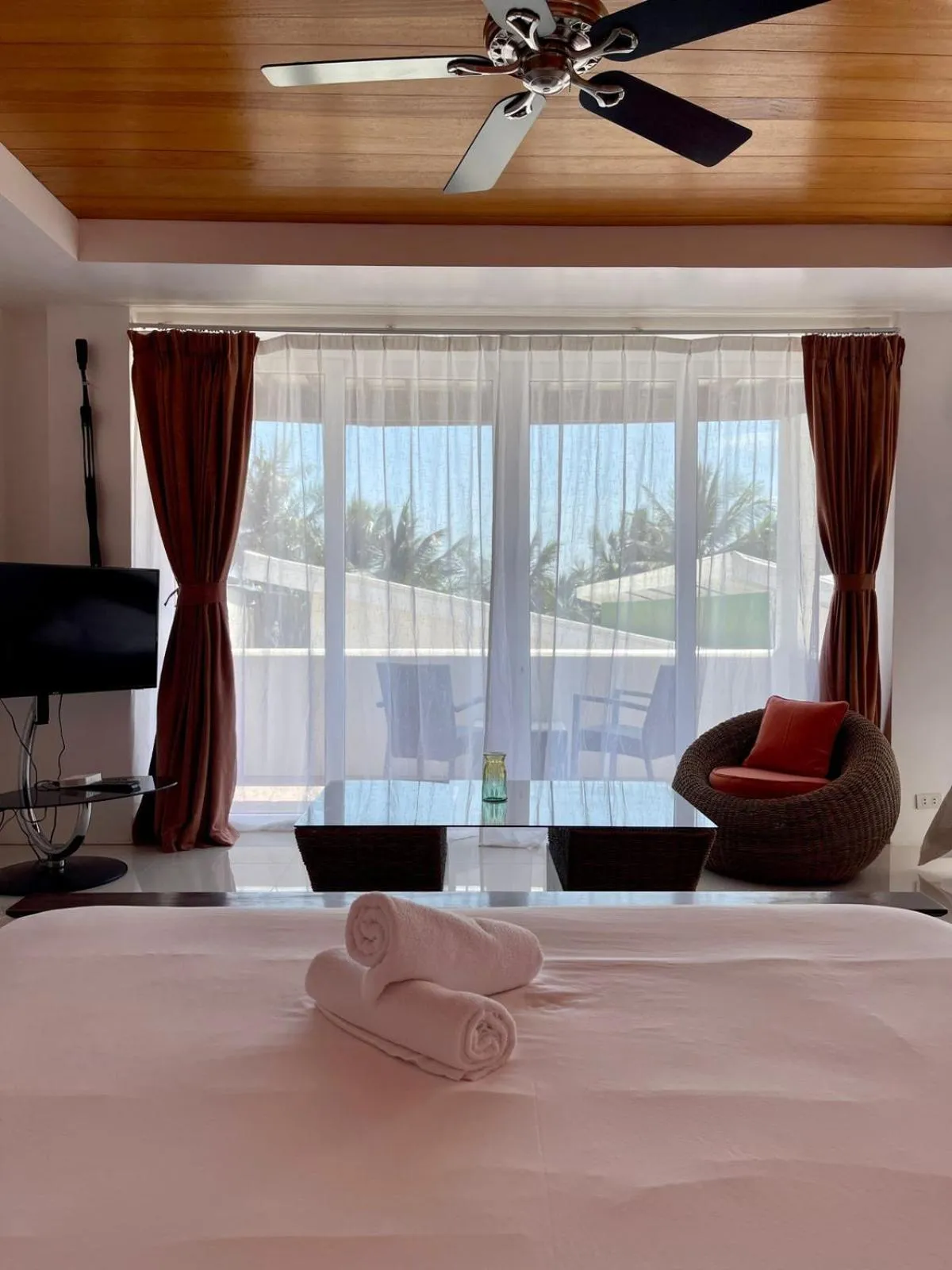 Balcony/Terrace, Bed in Calypso Beach and Dive Resort