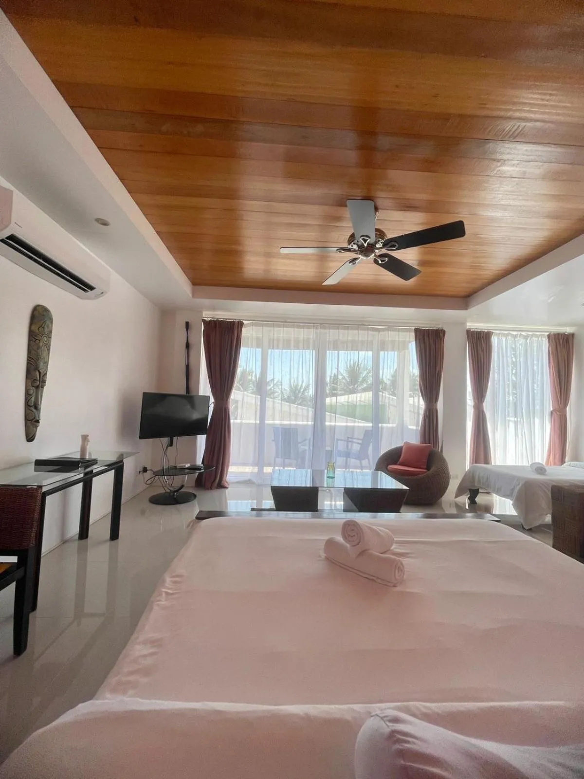 Bed in Calypso Beach and Dive Resort