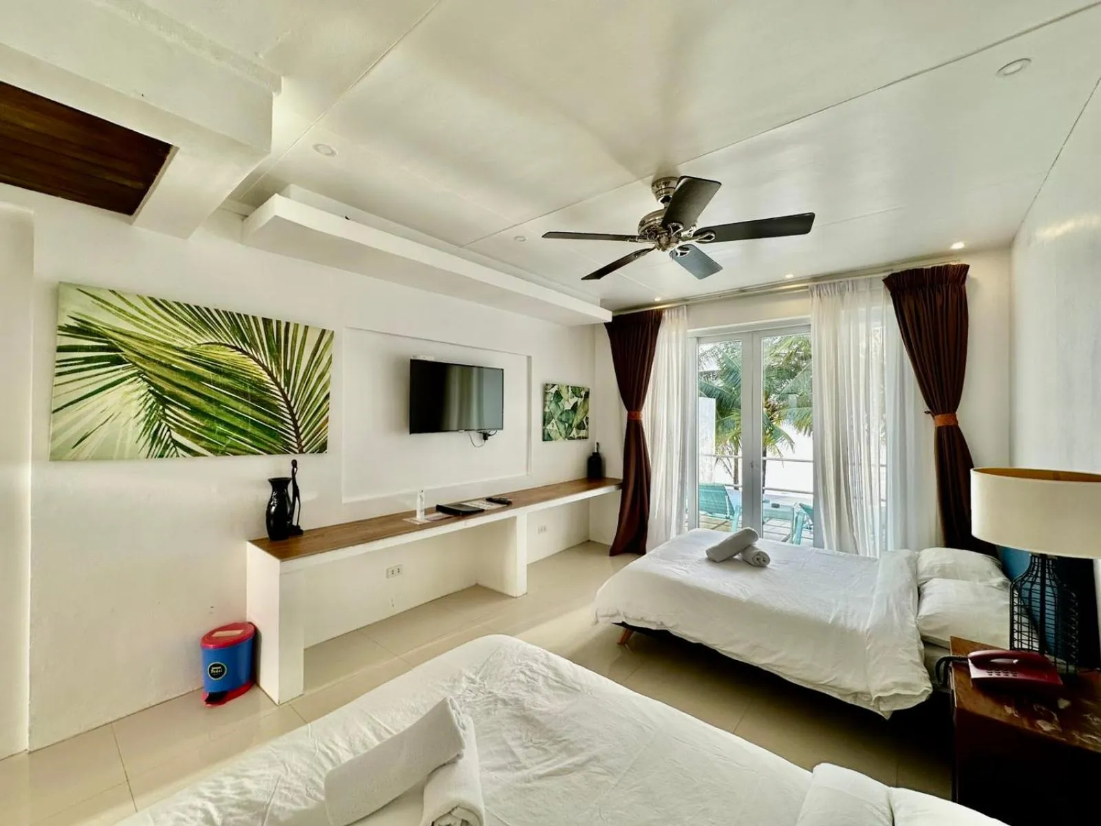 Bed in Calypso Beach and Dive Resort