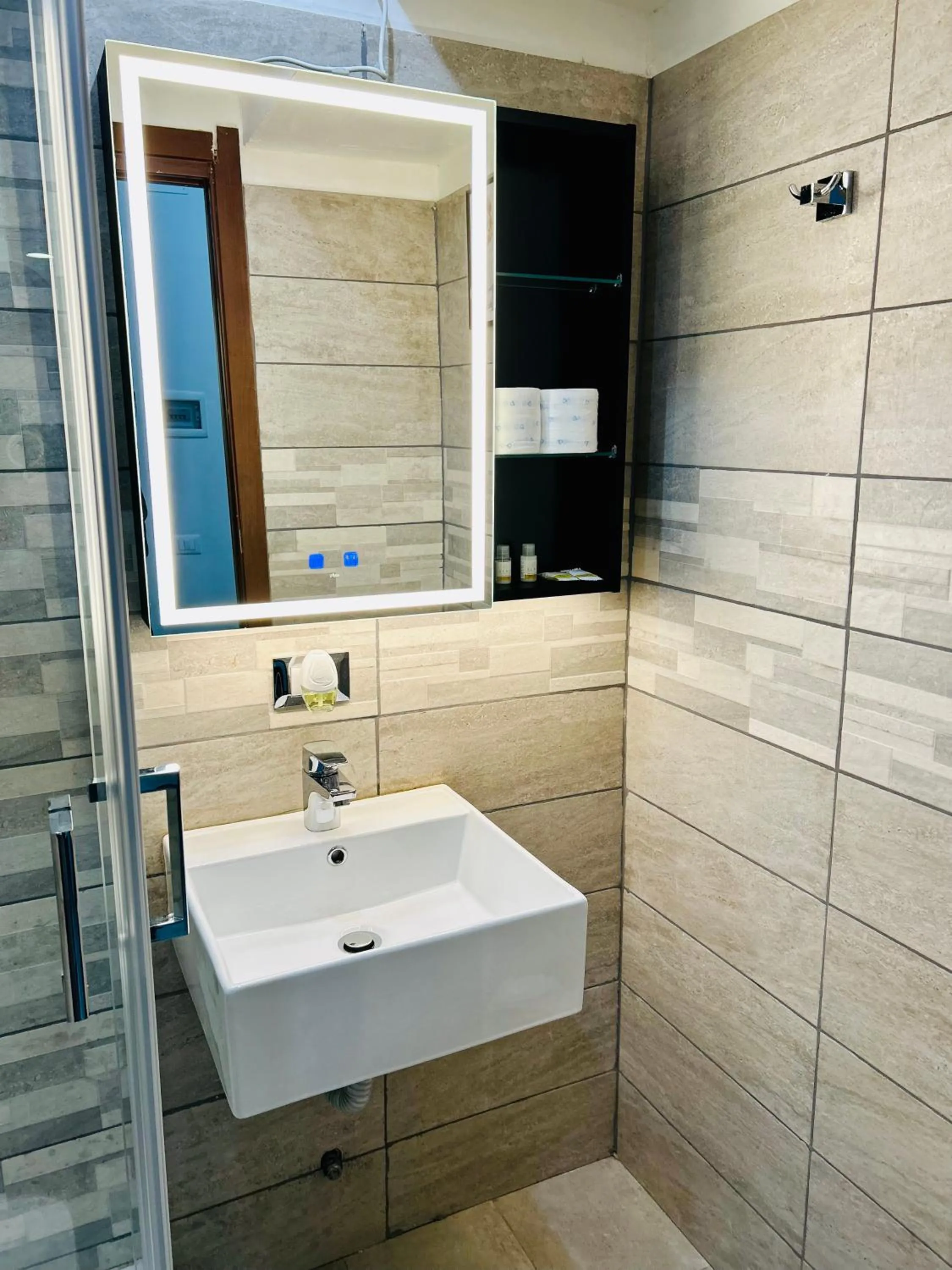 Bathroom in Grandis Rooms