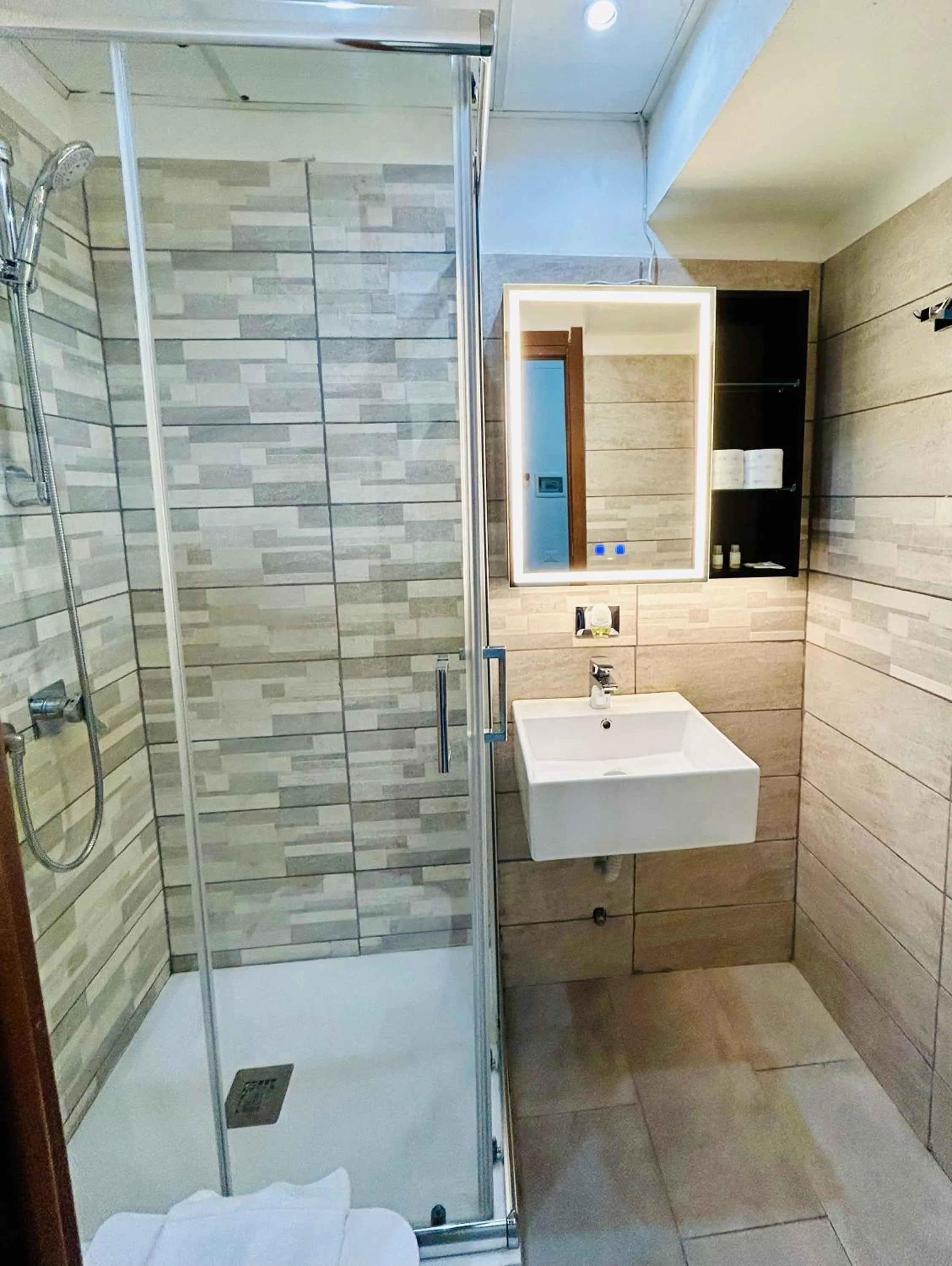 Bathroom in Grandis Rooms