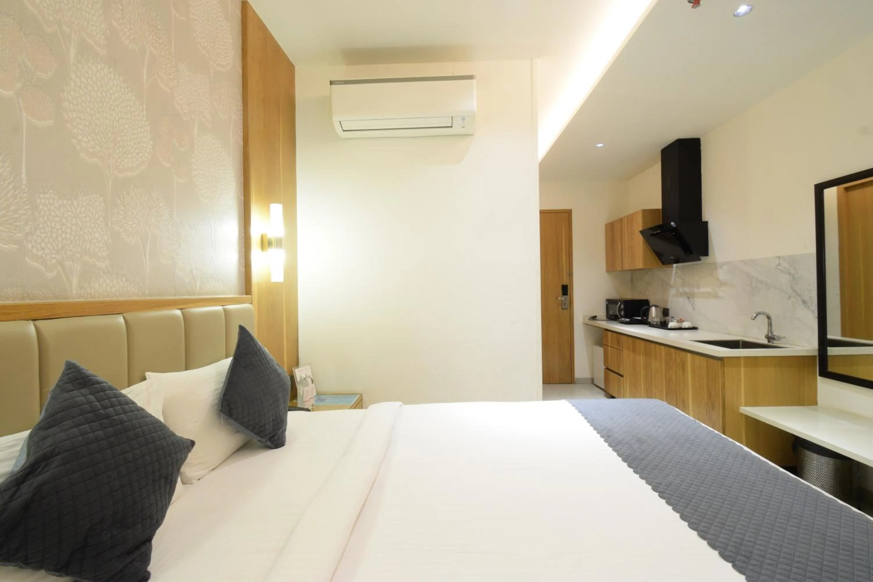 Photo of the whole room, Bed in Hotel TAAR TANGERINE Gachibowli