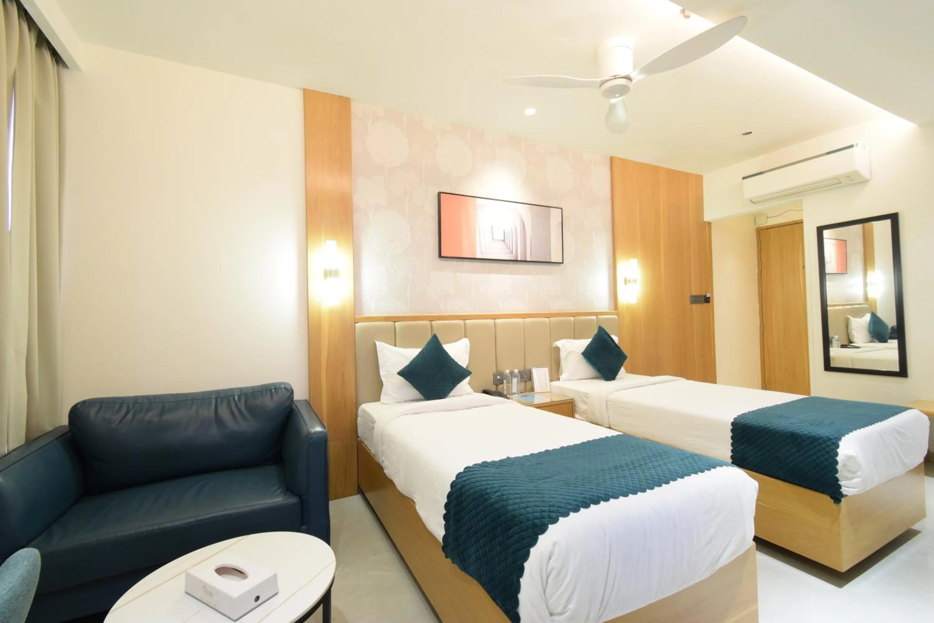 Bedroom, Bed in Hotel TAAR TANGERINE Gachibowli