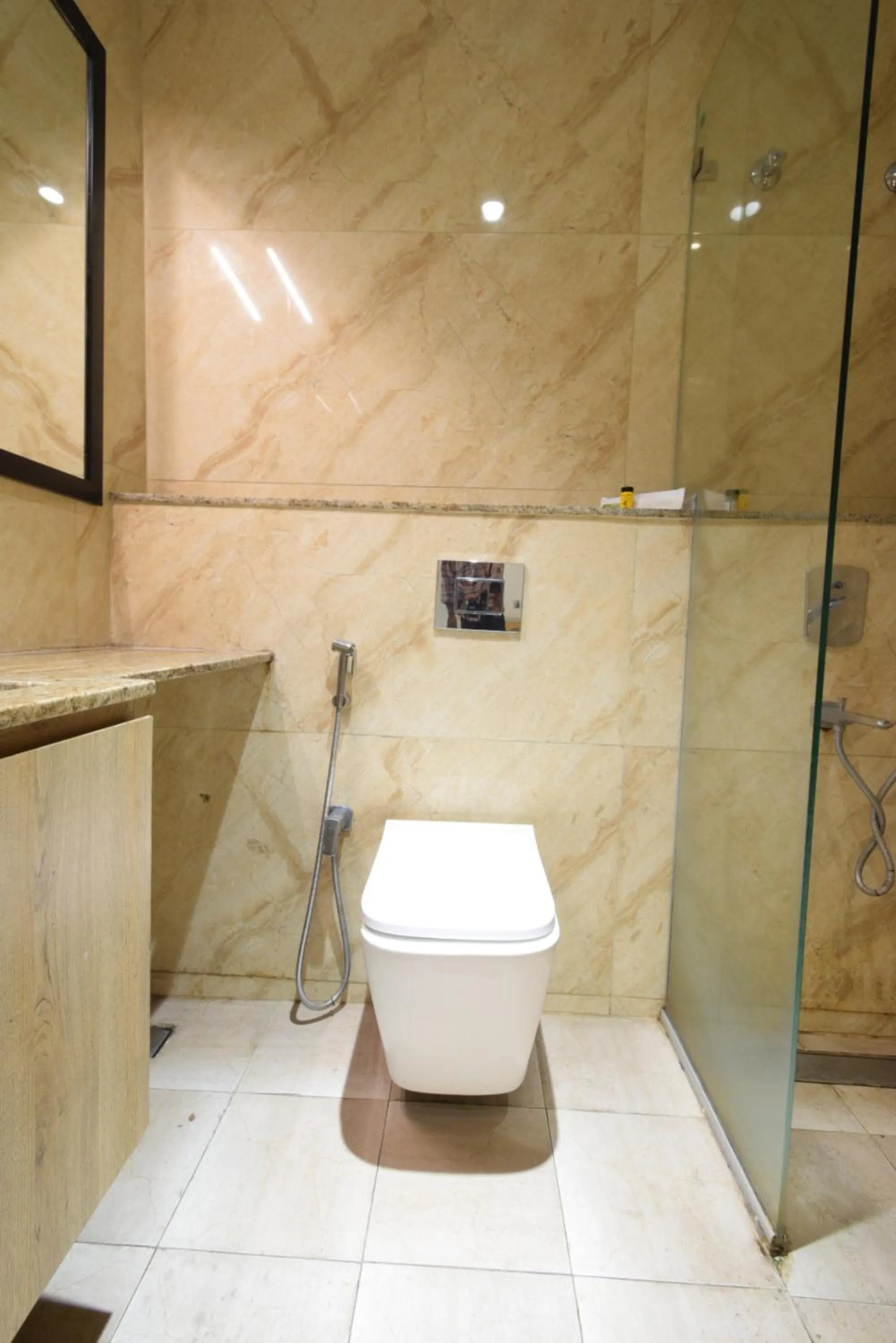 Toilet in Hotel TAAR TANGERINE Gachibowli