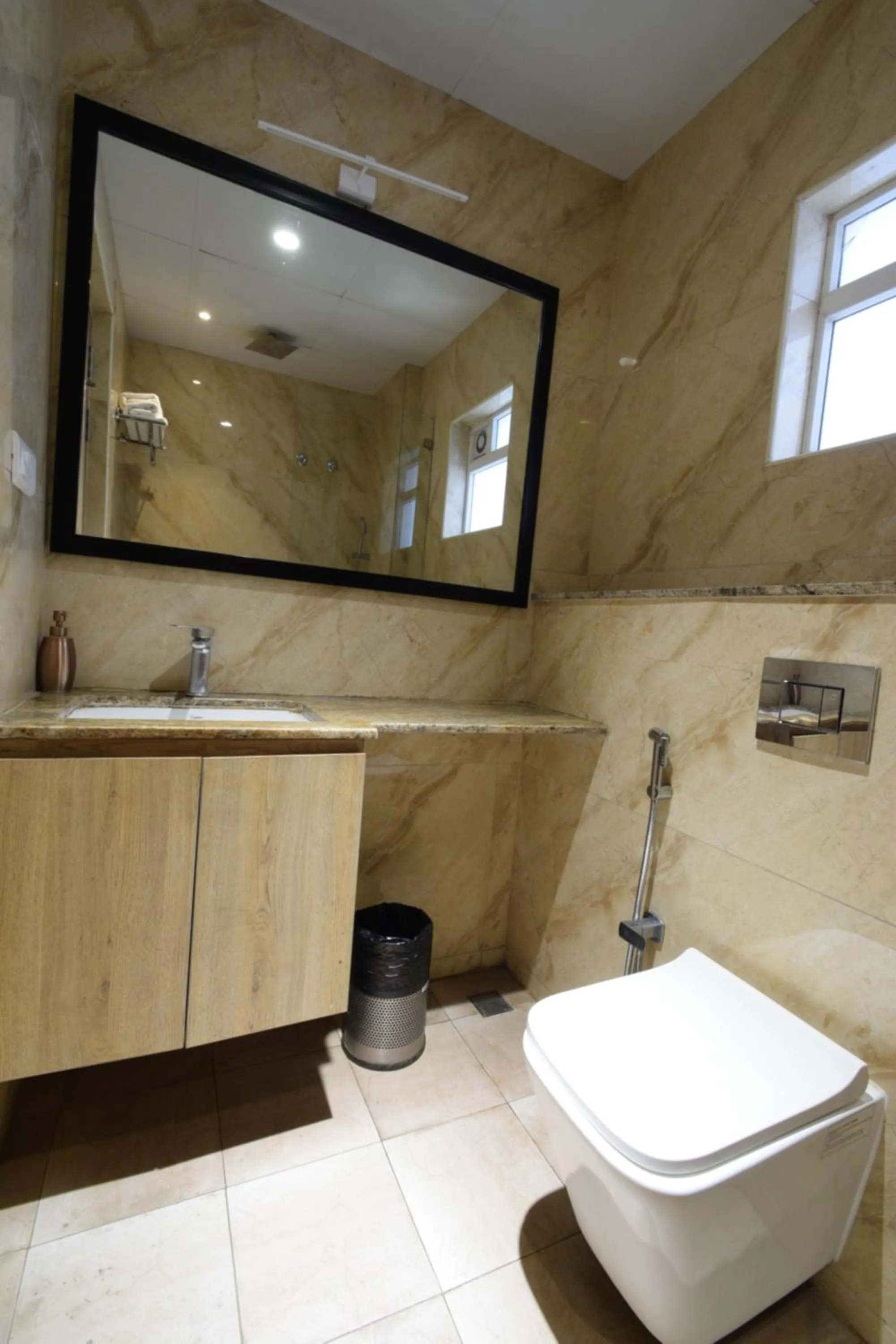 Bathroom in Hotel TAAR TANGERINE Gachibowli