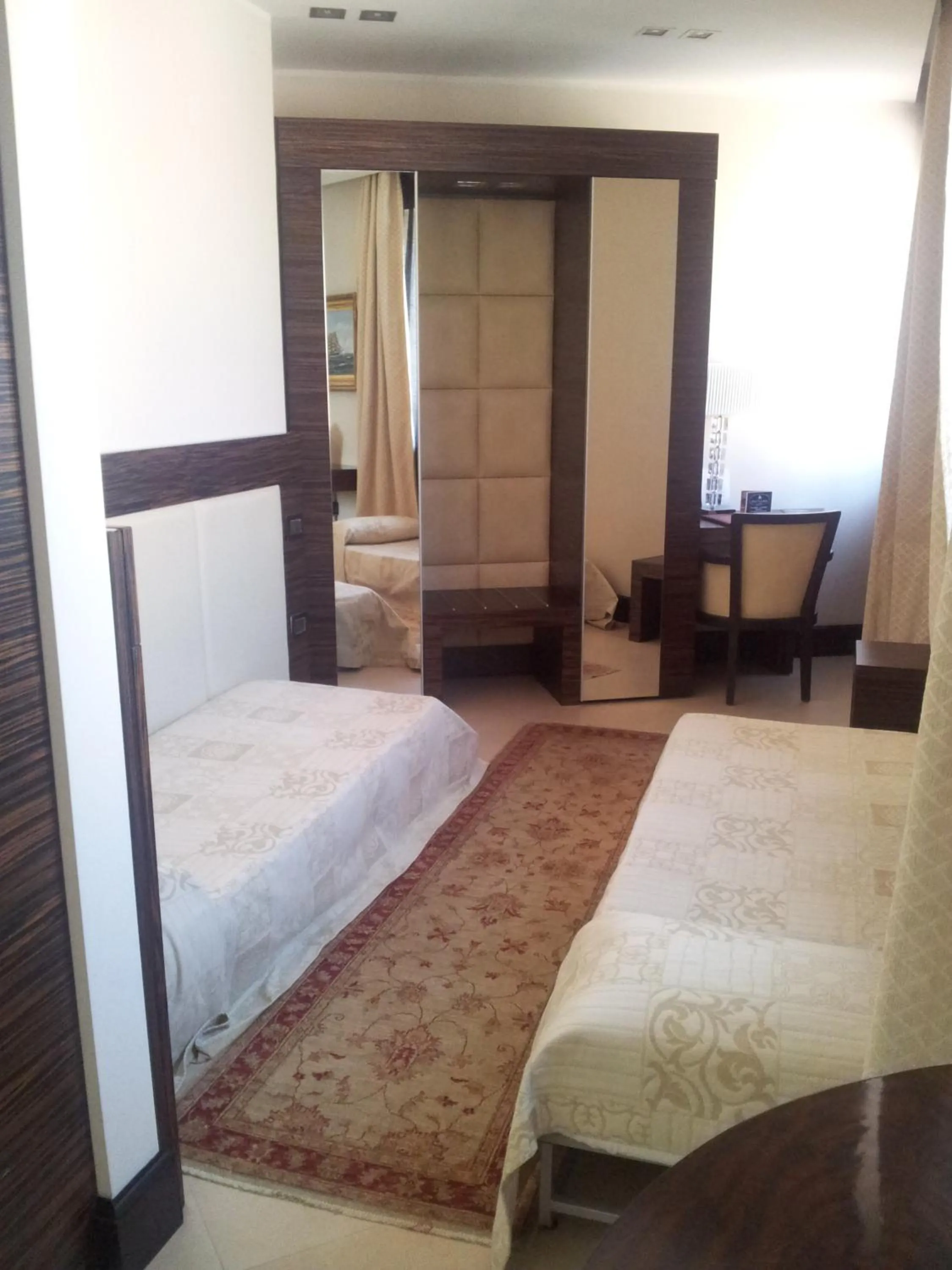 Bed in Hotel Excelsior