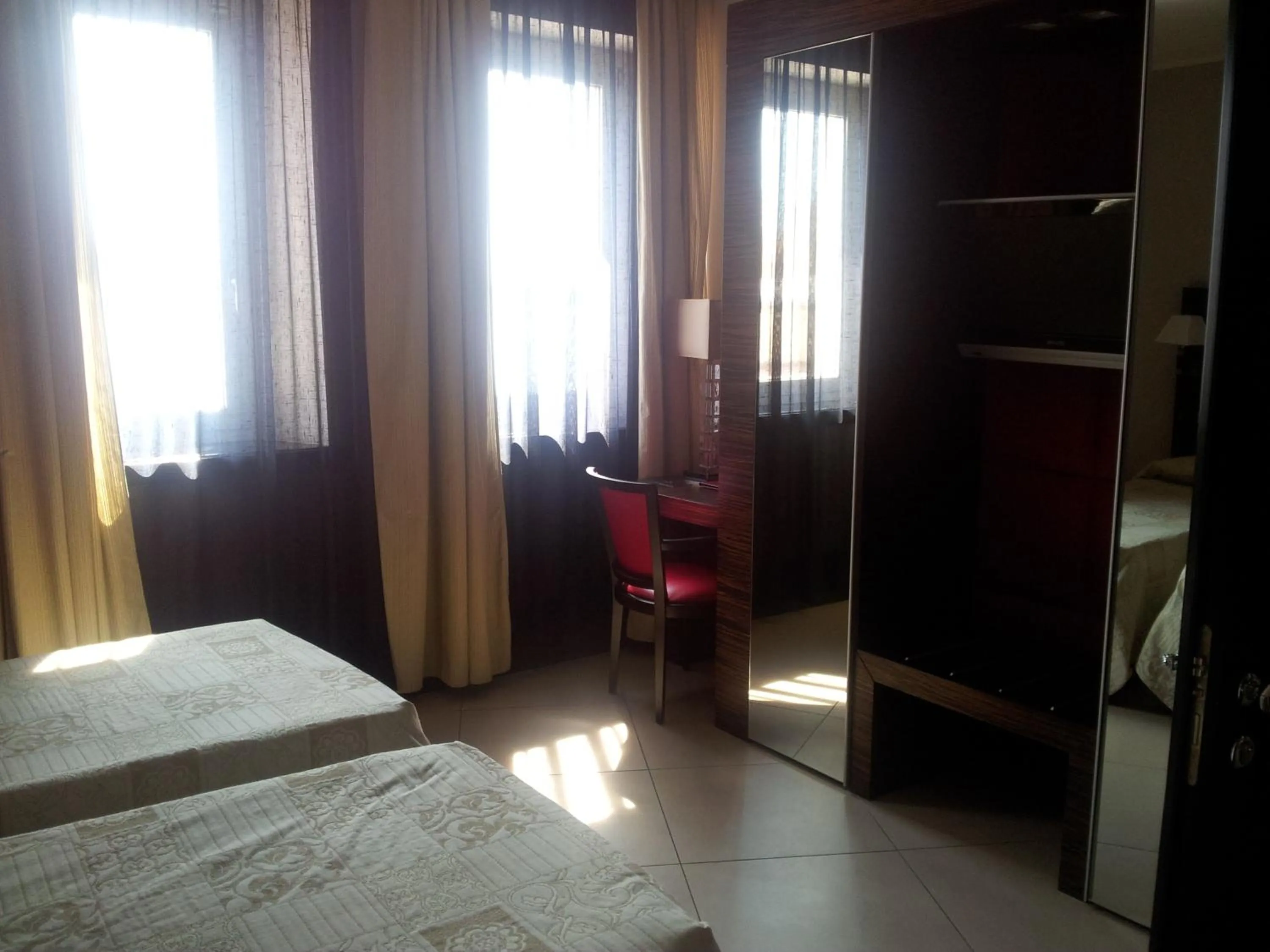 Bed in Hotel Excelsior