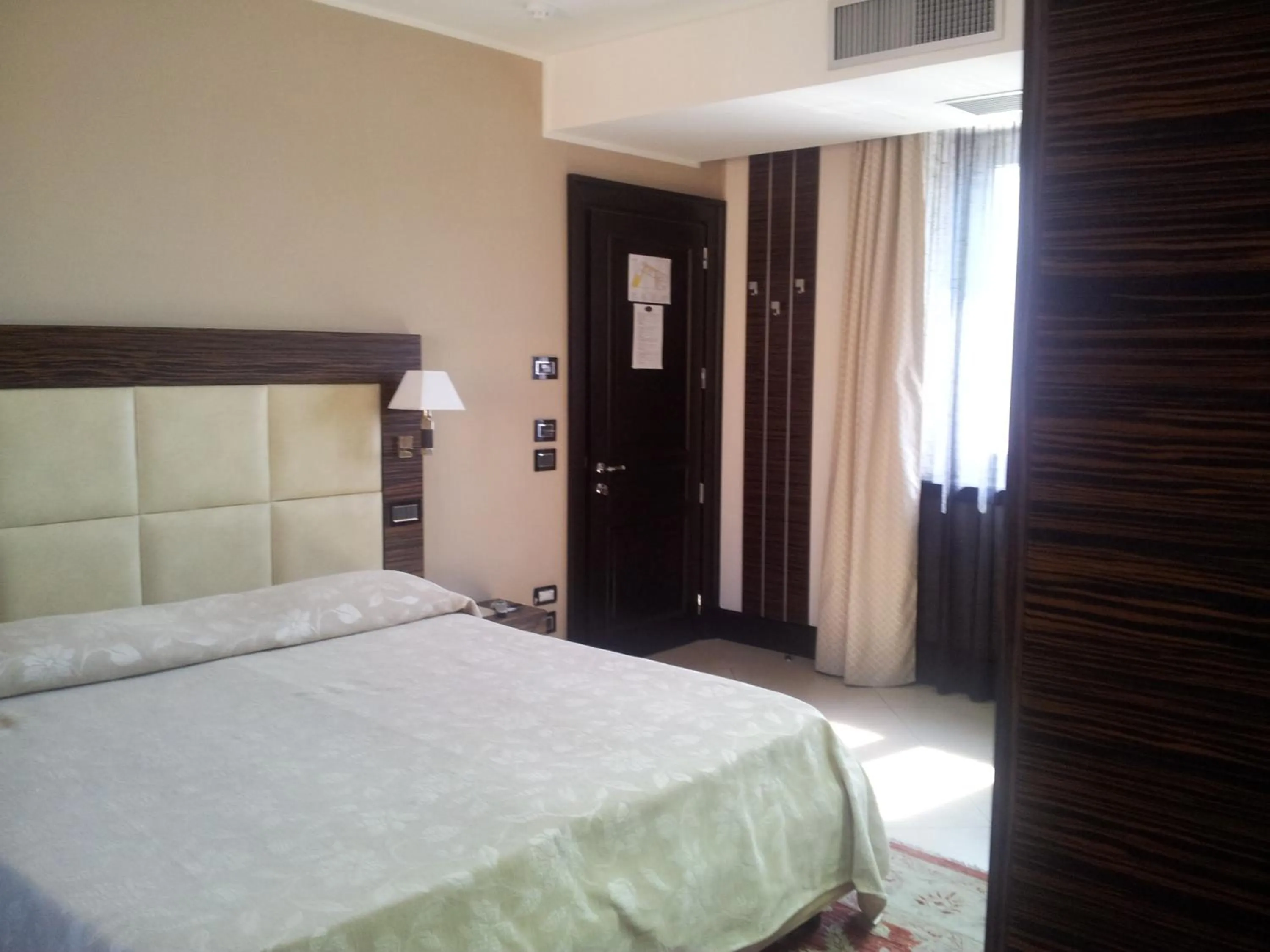 Bed in Hotel Excelsior