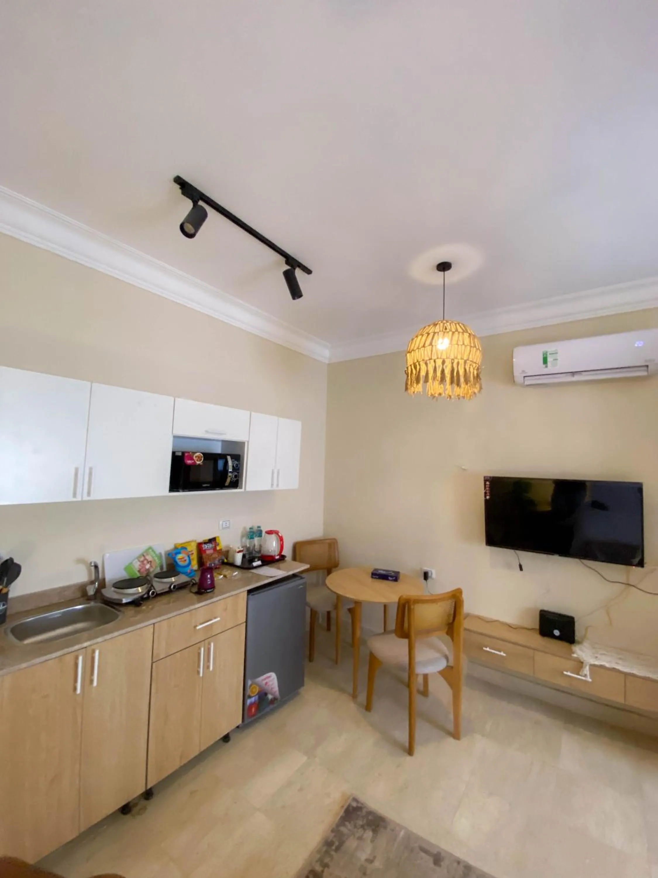 Kitchen or kitchenette in Settle Inn Al Rehab City B