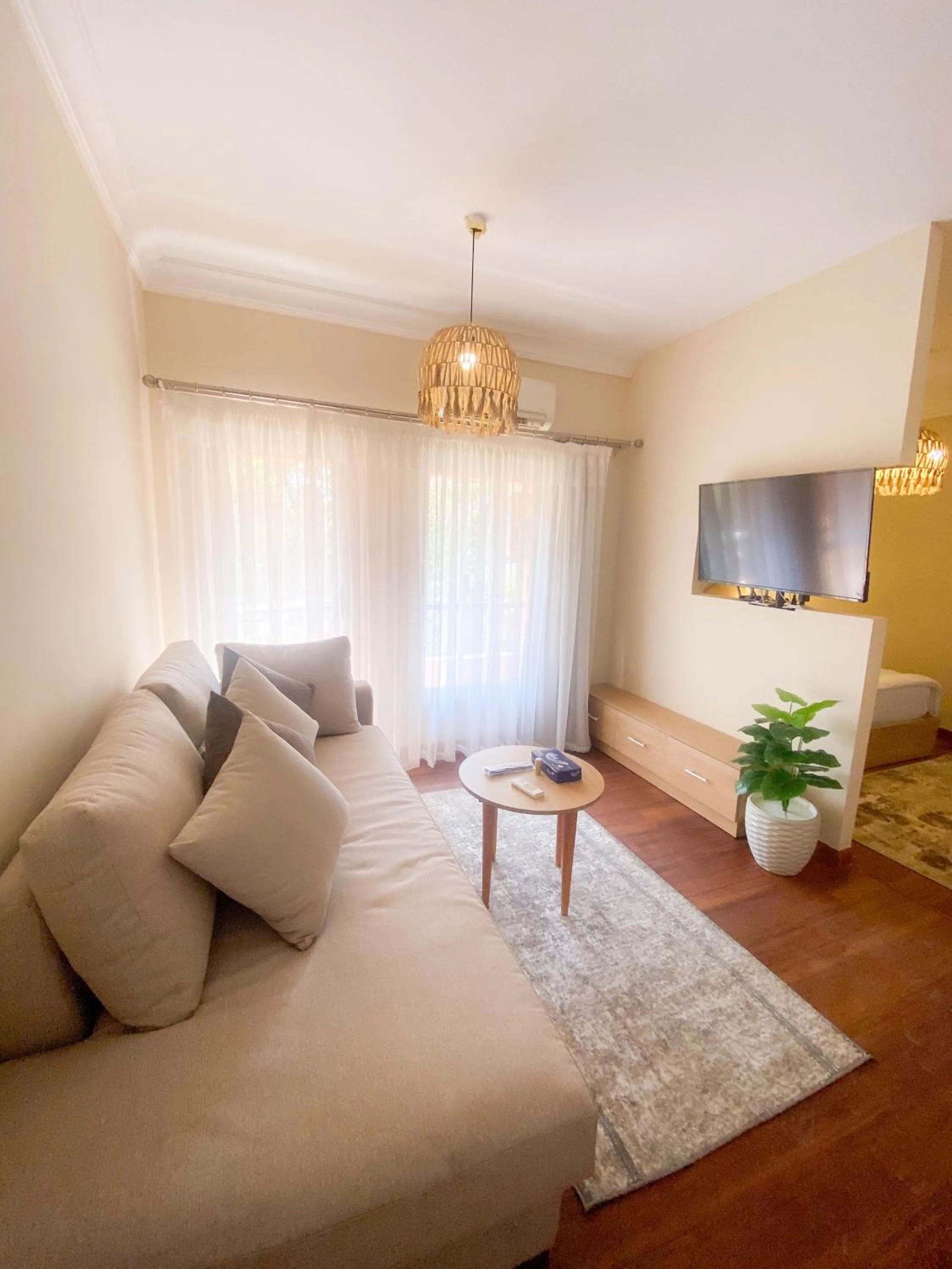 Living room in Settle Inn Al Rehab City B