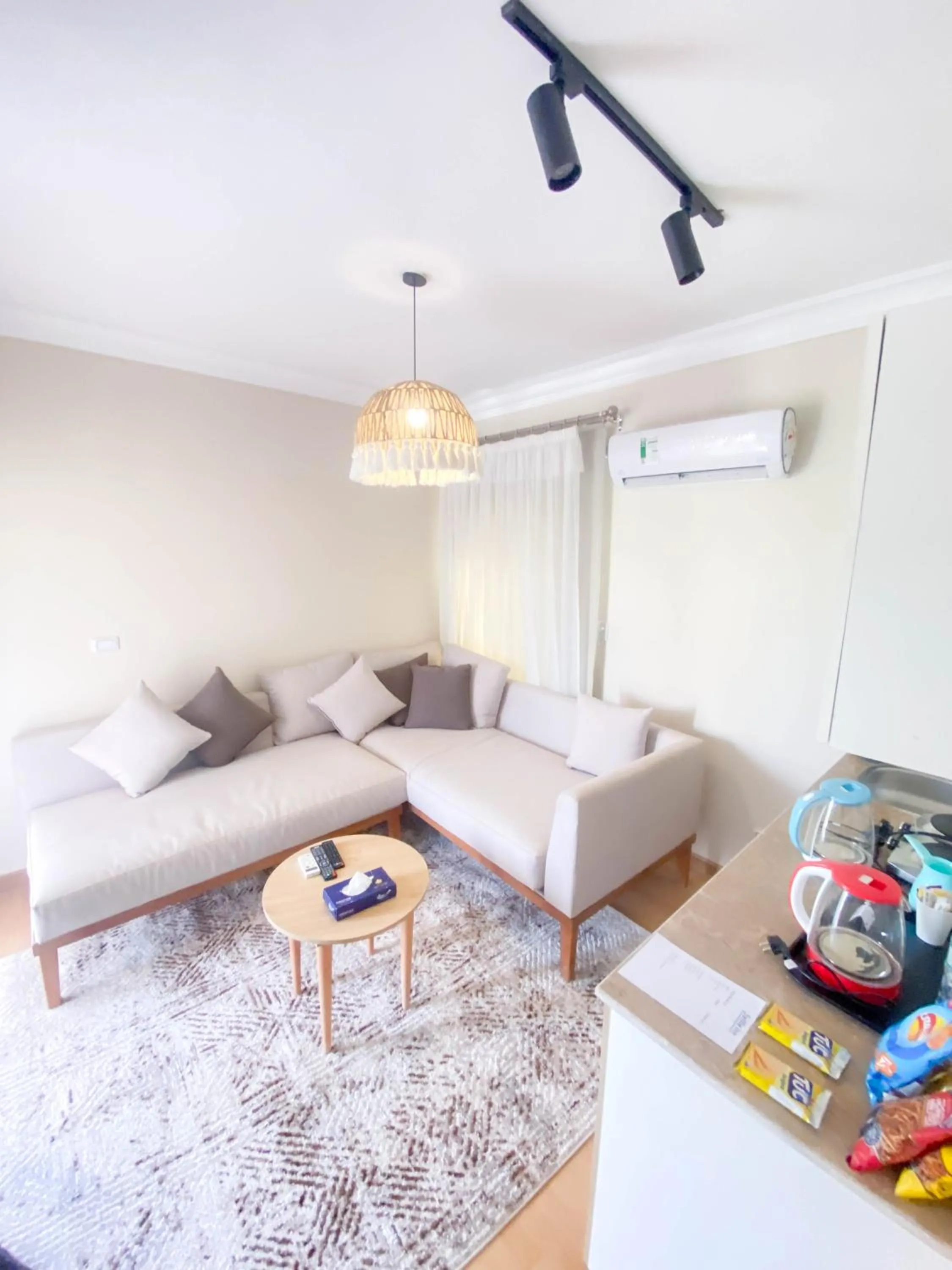 Living room in Settle Inn Al Rehab City B