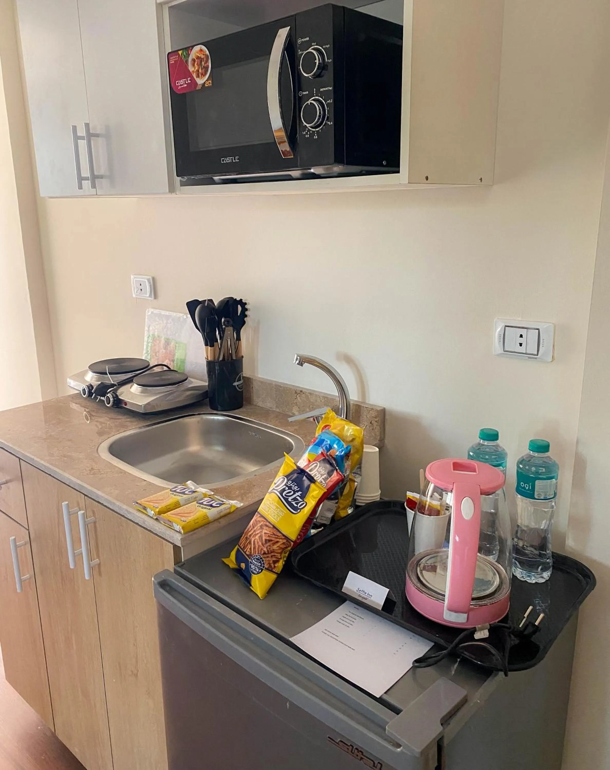 Kitchen or kitchenette in Settle Inn Al Rehab City B