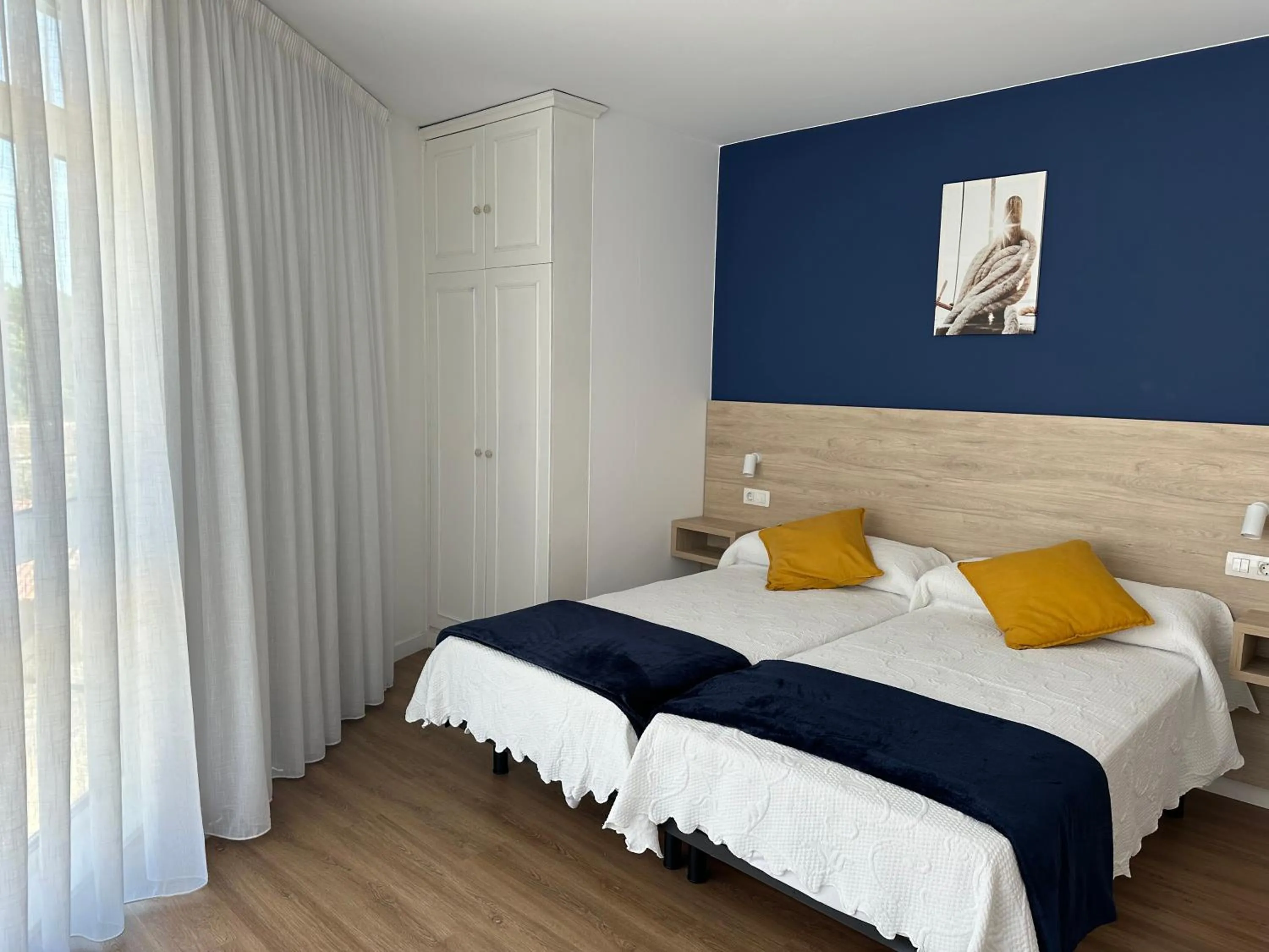 Photo of the whole room, Bed in Hotel Playa de Sardiñeiro