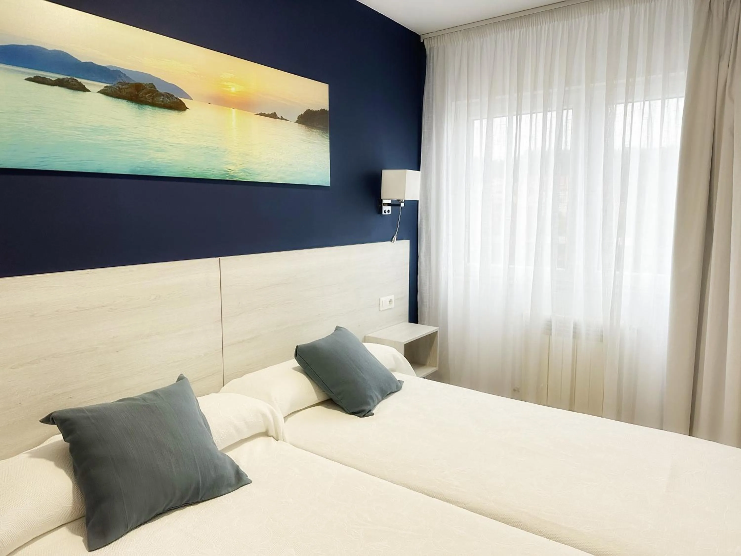 Photo of the whole room, Bed in Hotel Playa de Sardiñeiro