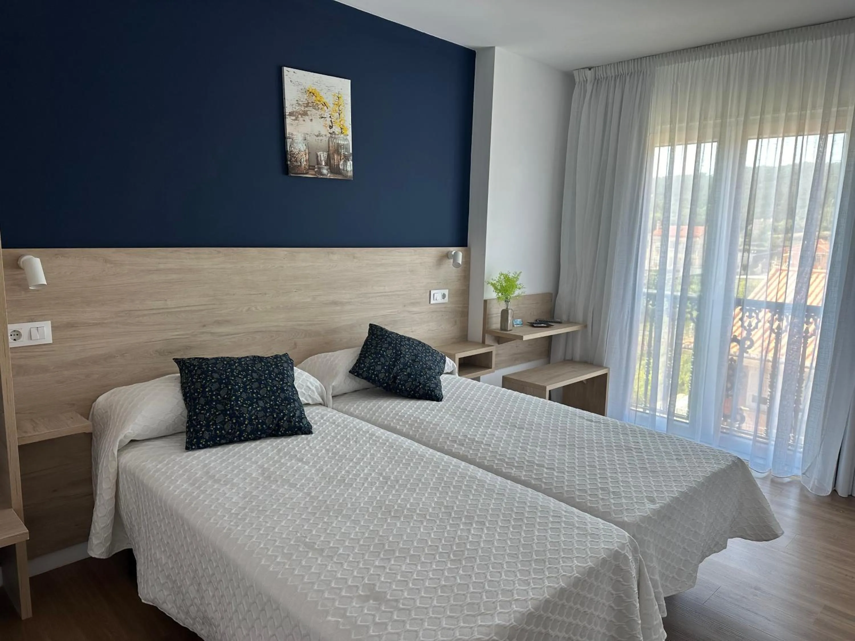 Photo of the whole room, Bed in Hotel Playa de Sardiñeiro