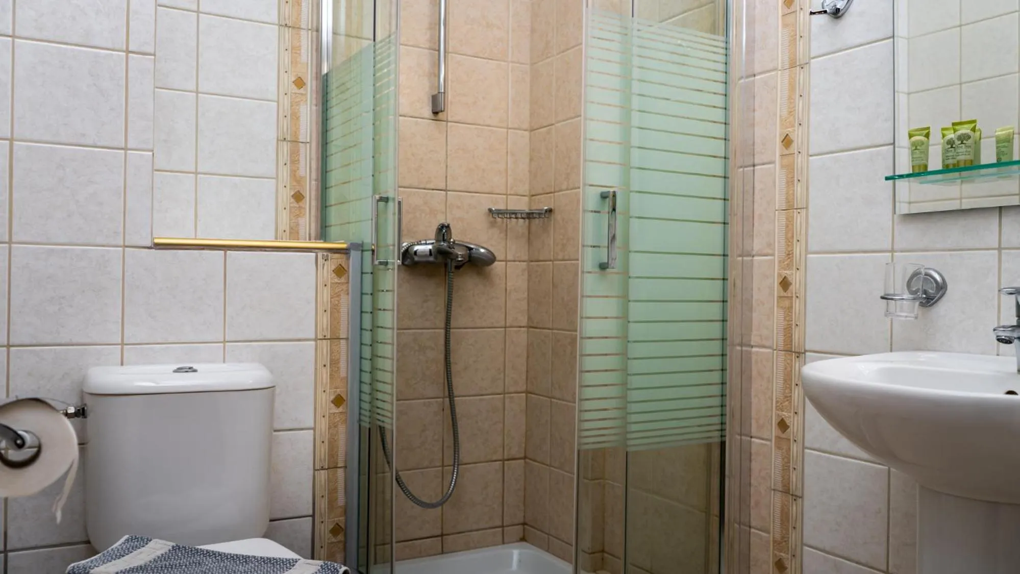 Bathroom in Dellas Boutique Hotel