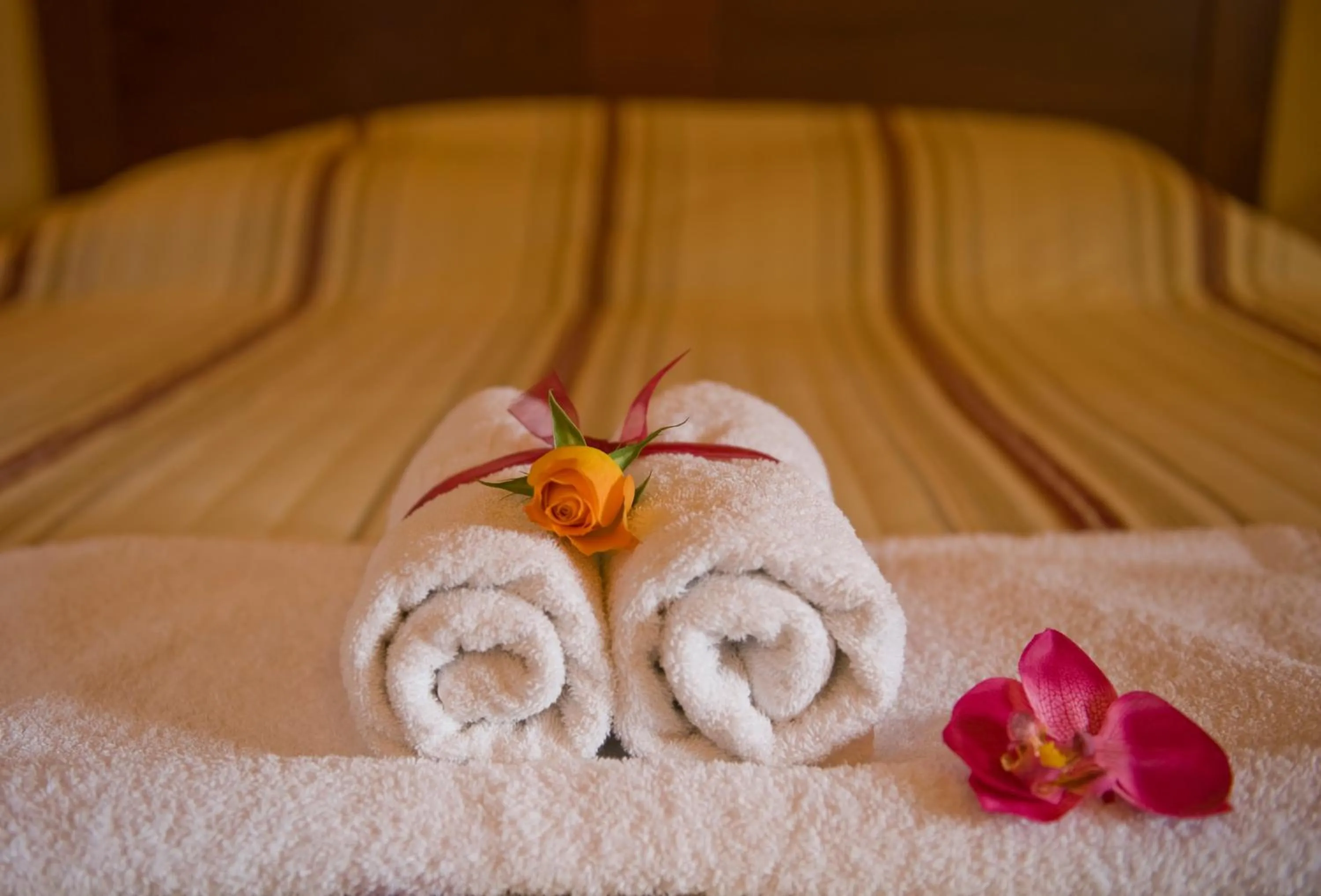 Bed in Dellas Boutique Hotel