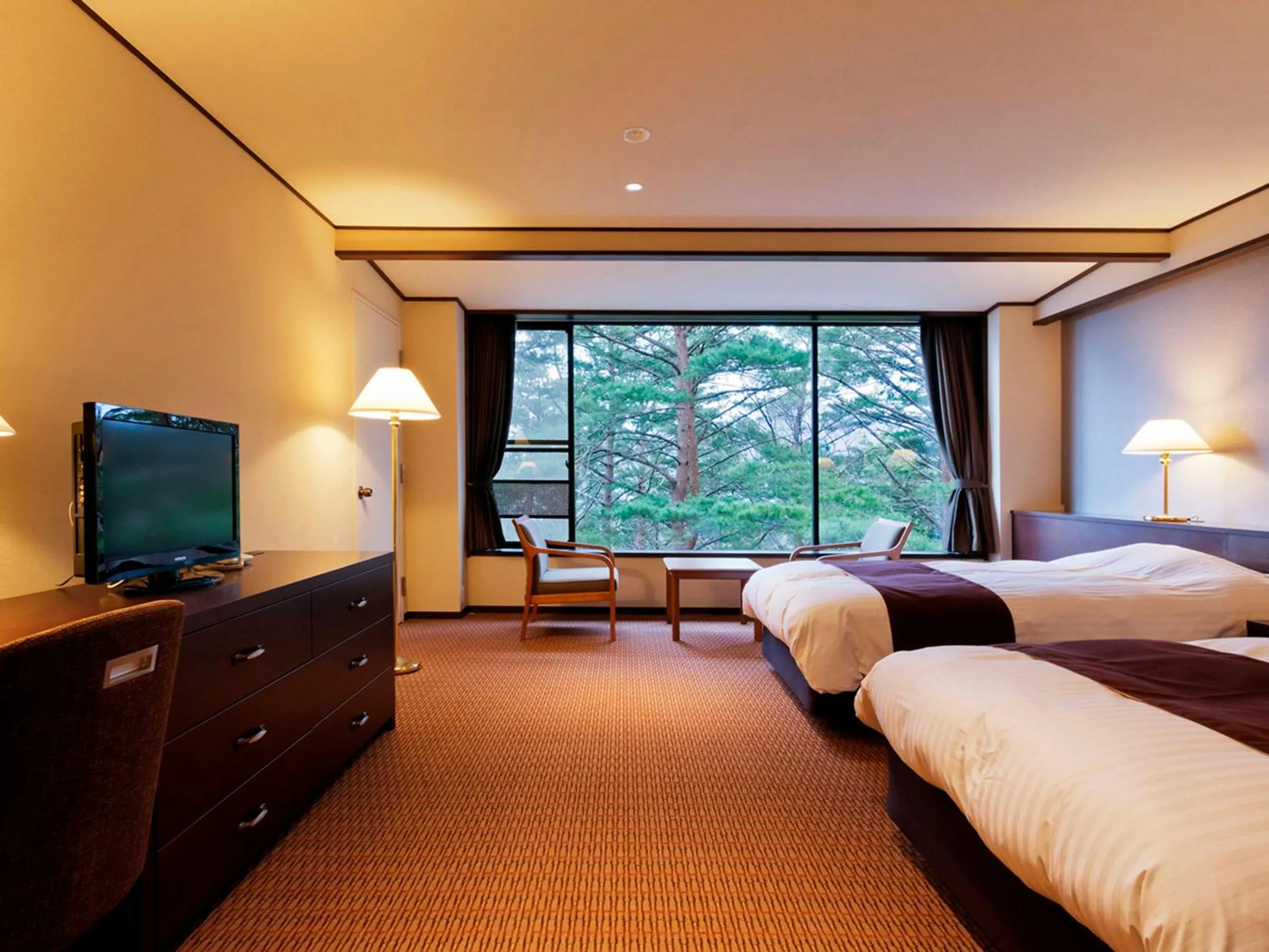 Bed in Jodogahama Park Hotel