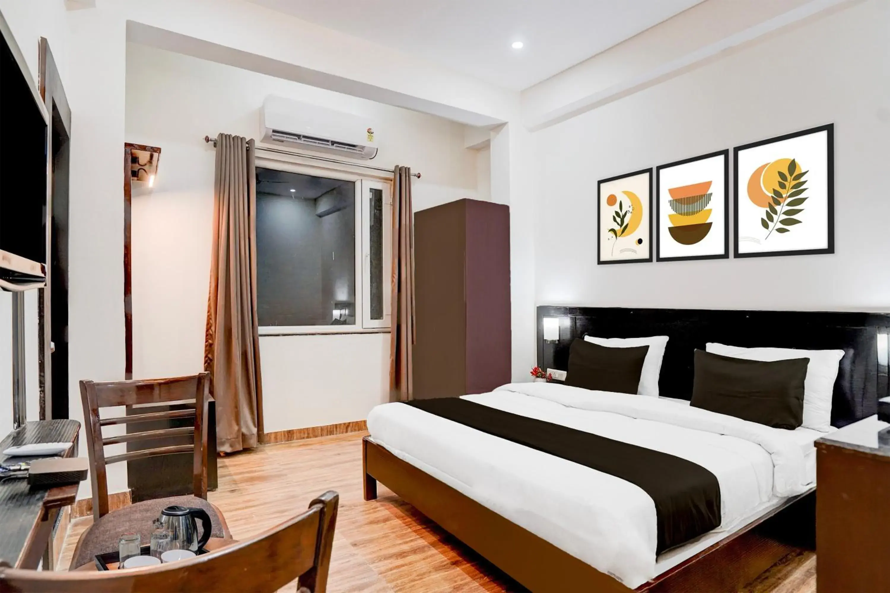 Classic Triple Room - single occupancy in Palette by CheckIn Sarnath Temple Classic Triple Room - single occupancy in Palette by CheckIn Sarnath Temple