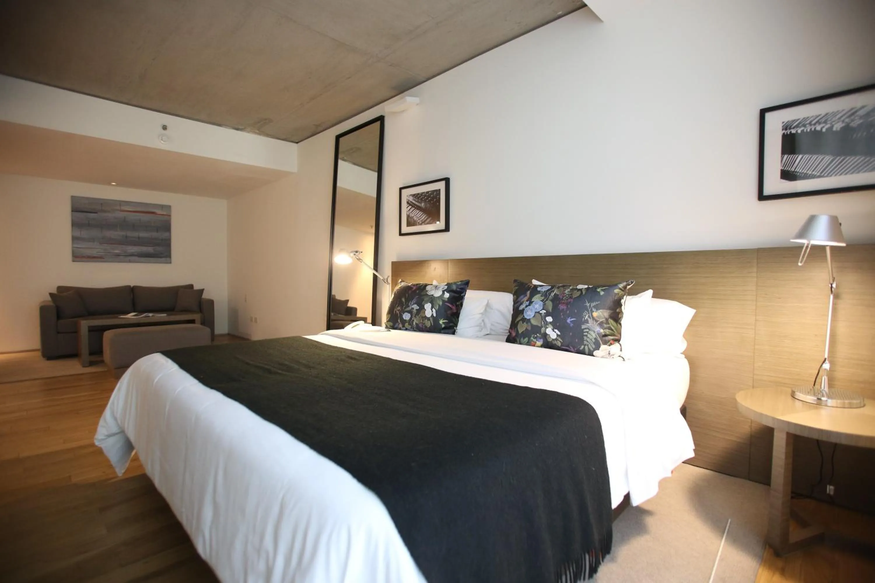 Living room, Bed in Anselmo Buenos Aires, Curio Collection by Hilton