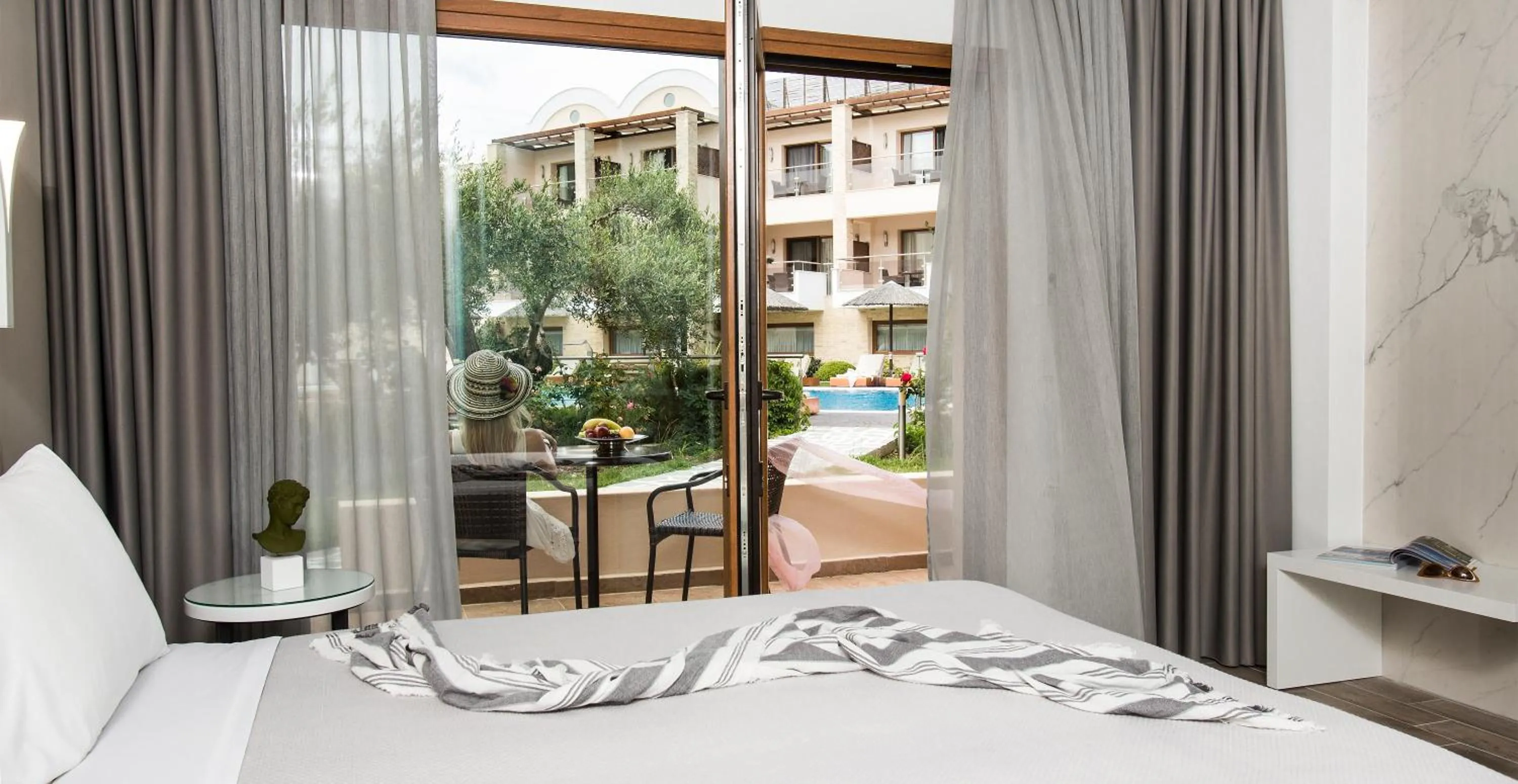 Pool view, Bed in Olympion Sunset Halkidiki