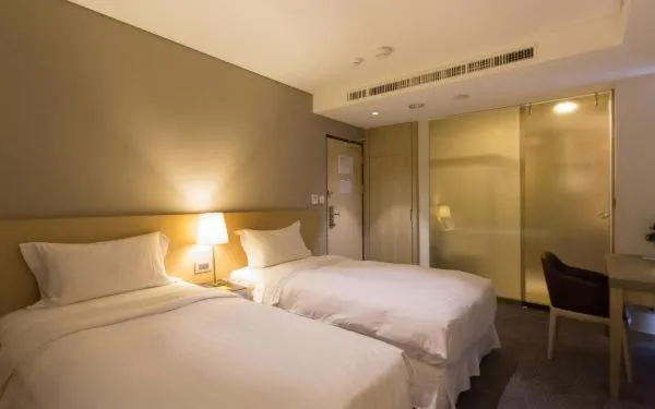 Bed in Lessing Hotel Qixian