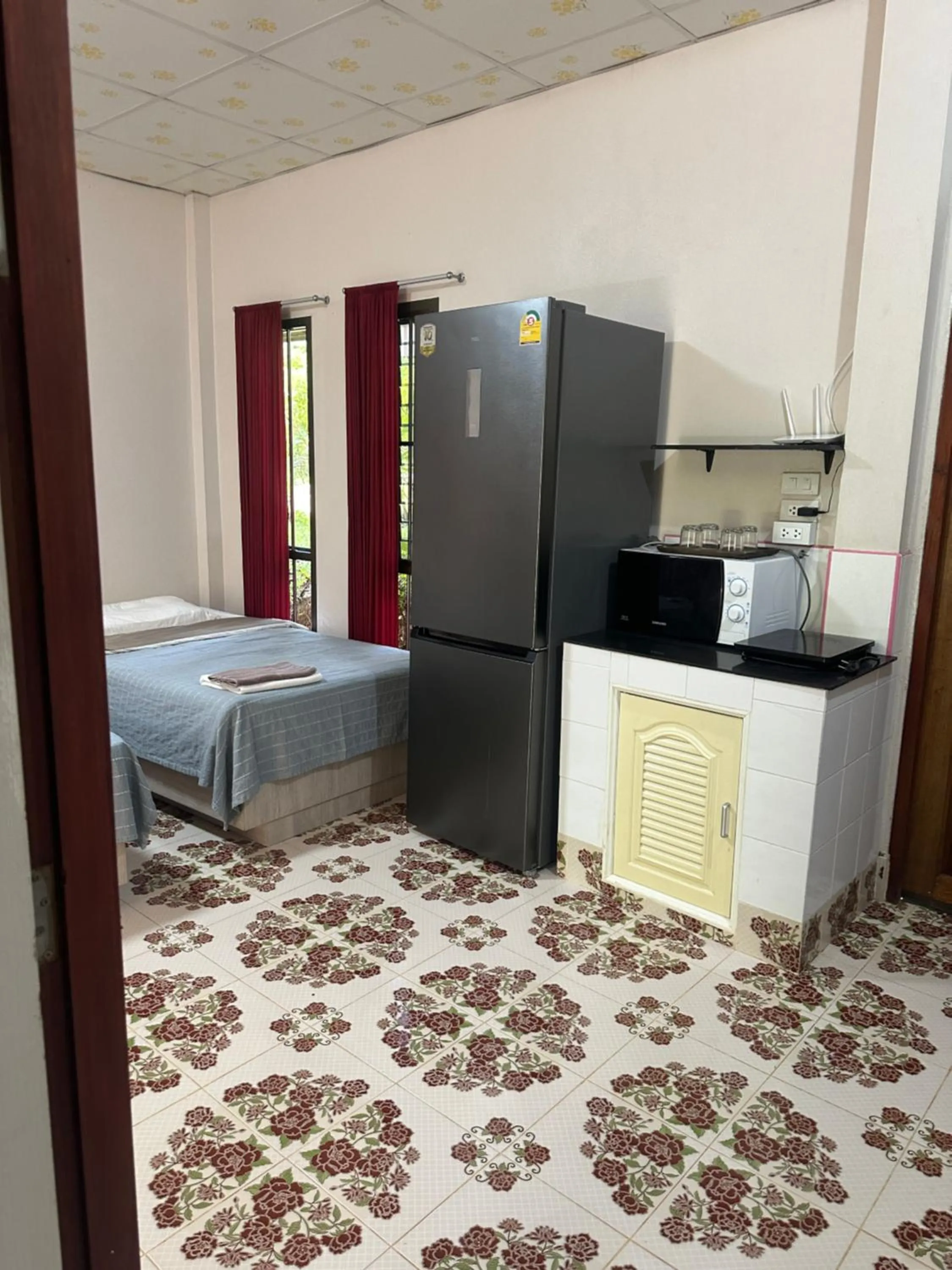 Living room, Bed in Fine Times Resort