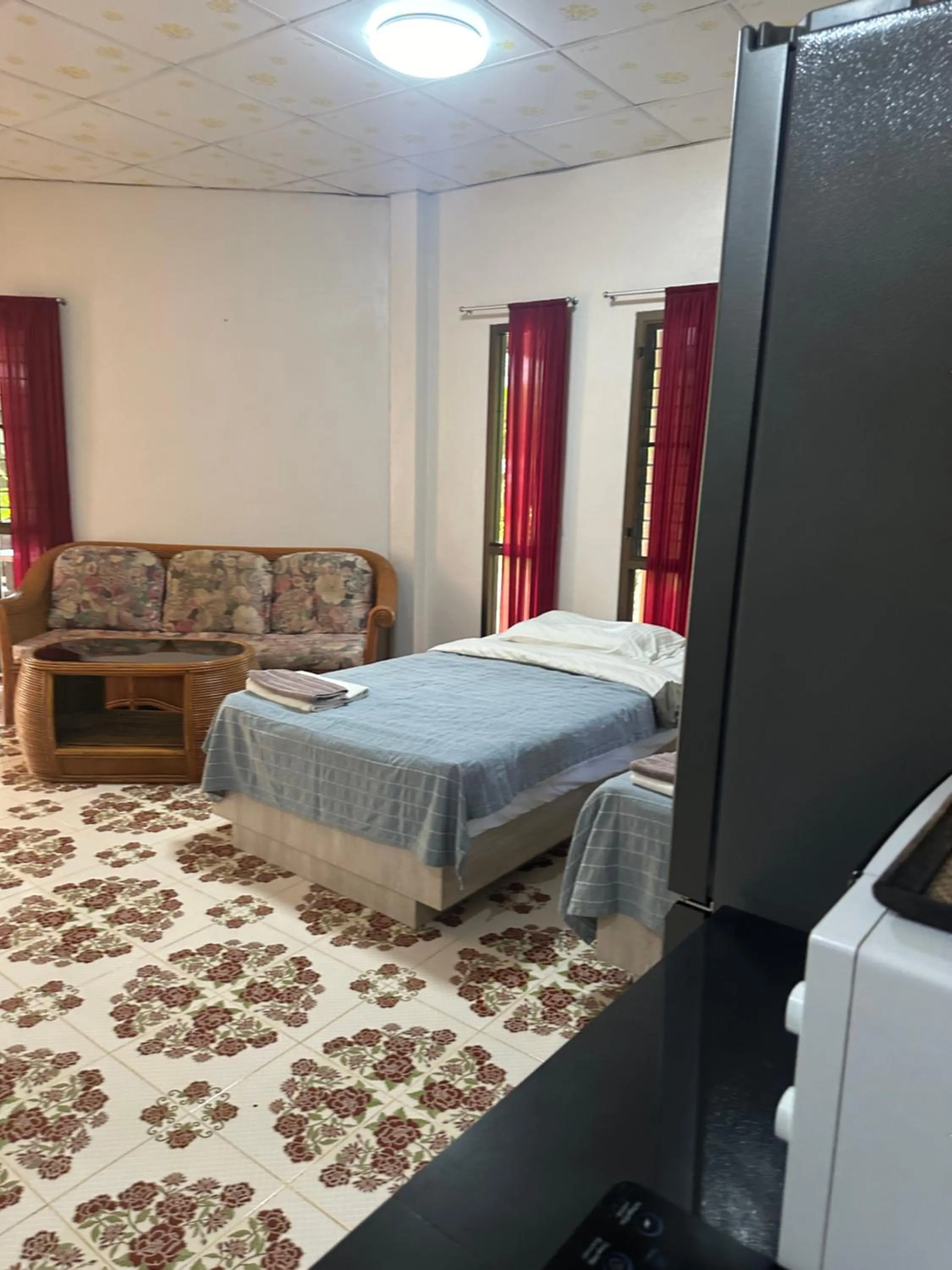 Living room, Bed in Fine Times Resort