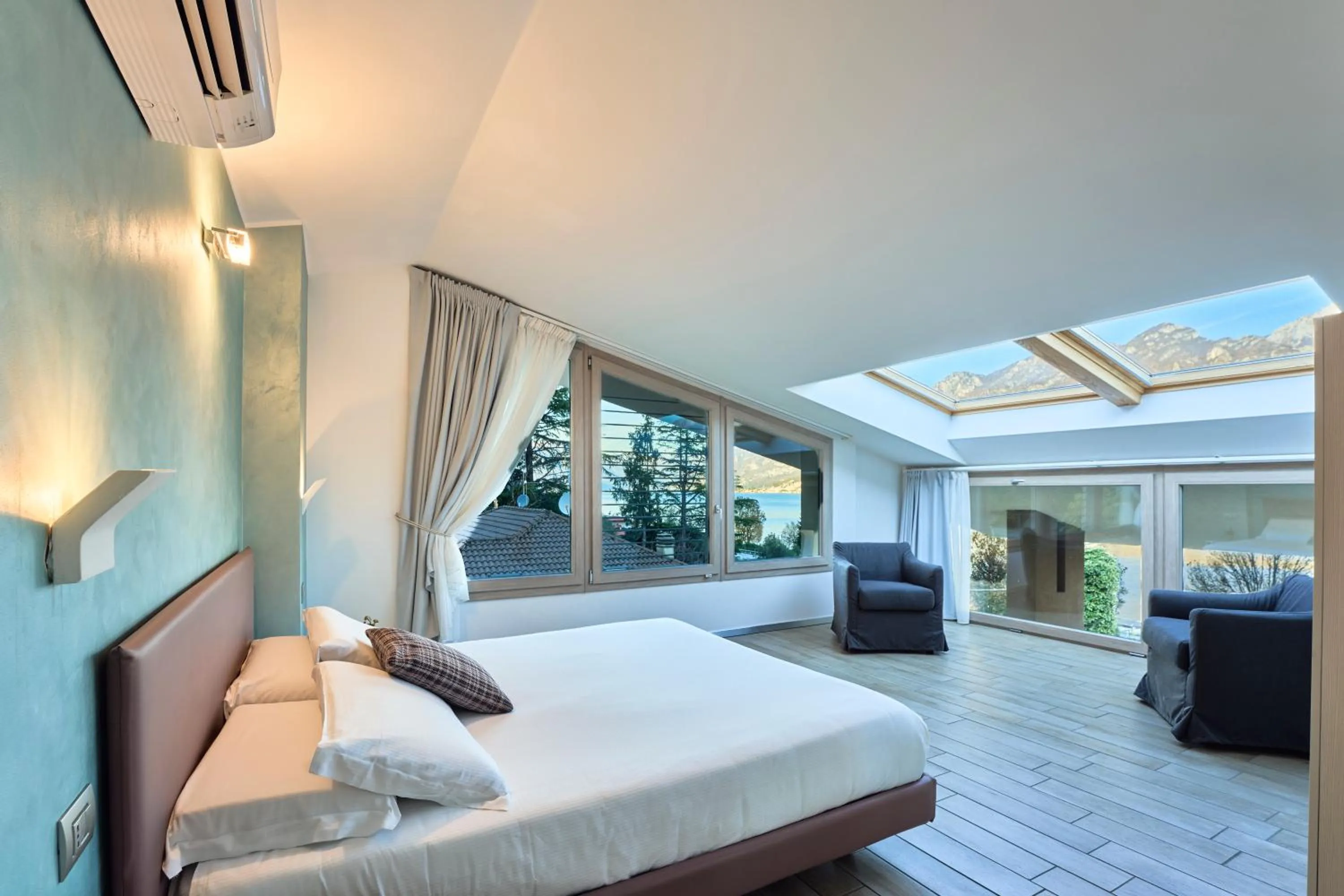 Bedroom, Bed in Bellagio Village - Holiday Apartments by the Lake - Seasonal Warm Pool and Sauna