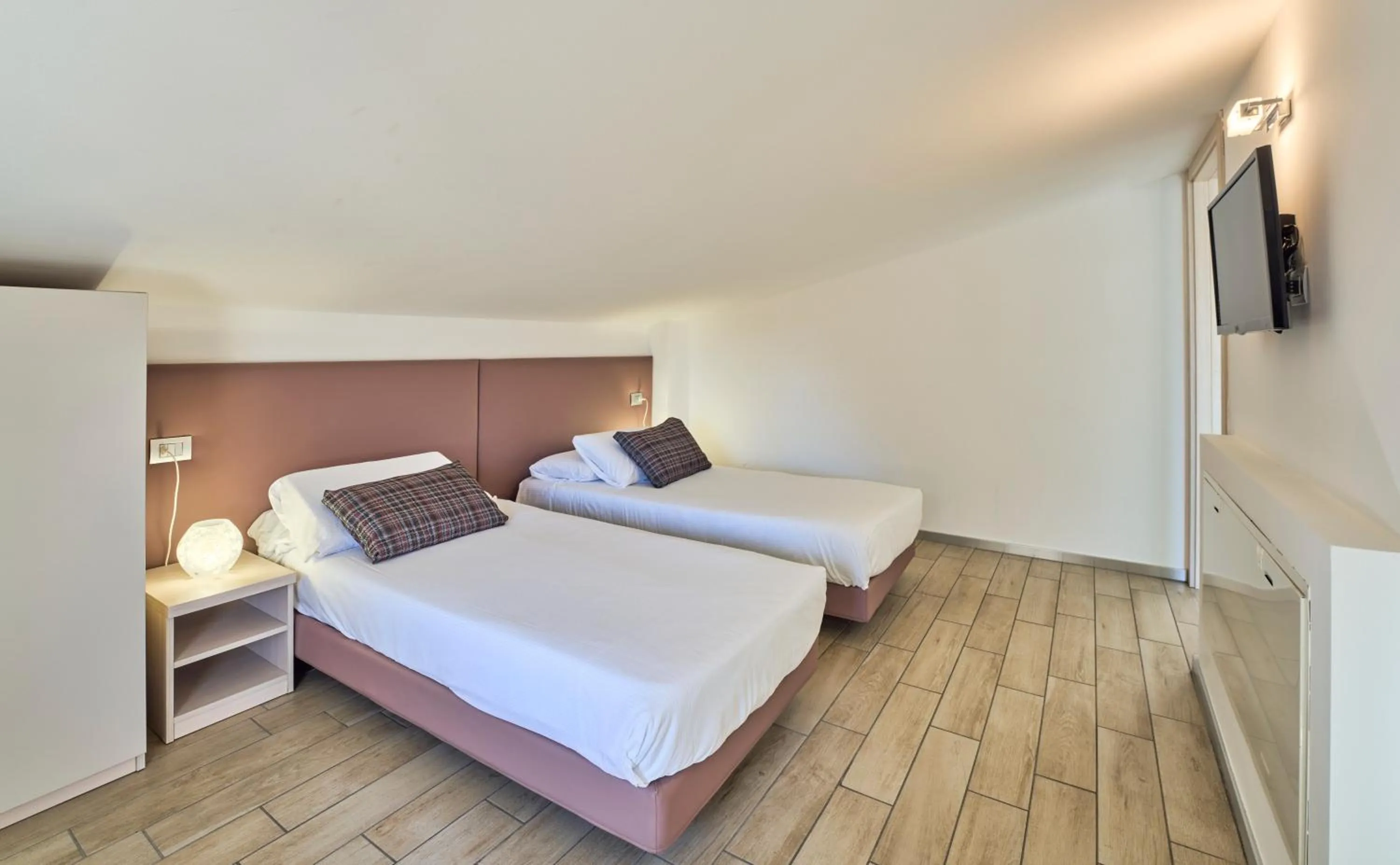 Bedroom, Bed in Bellagio Village - Holiday Apartments by the Lake - Seasonal Warm Pool and Sauna