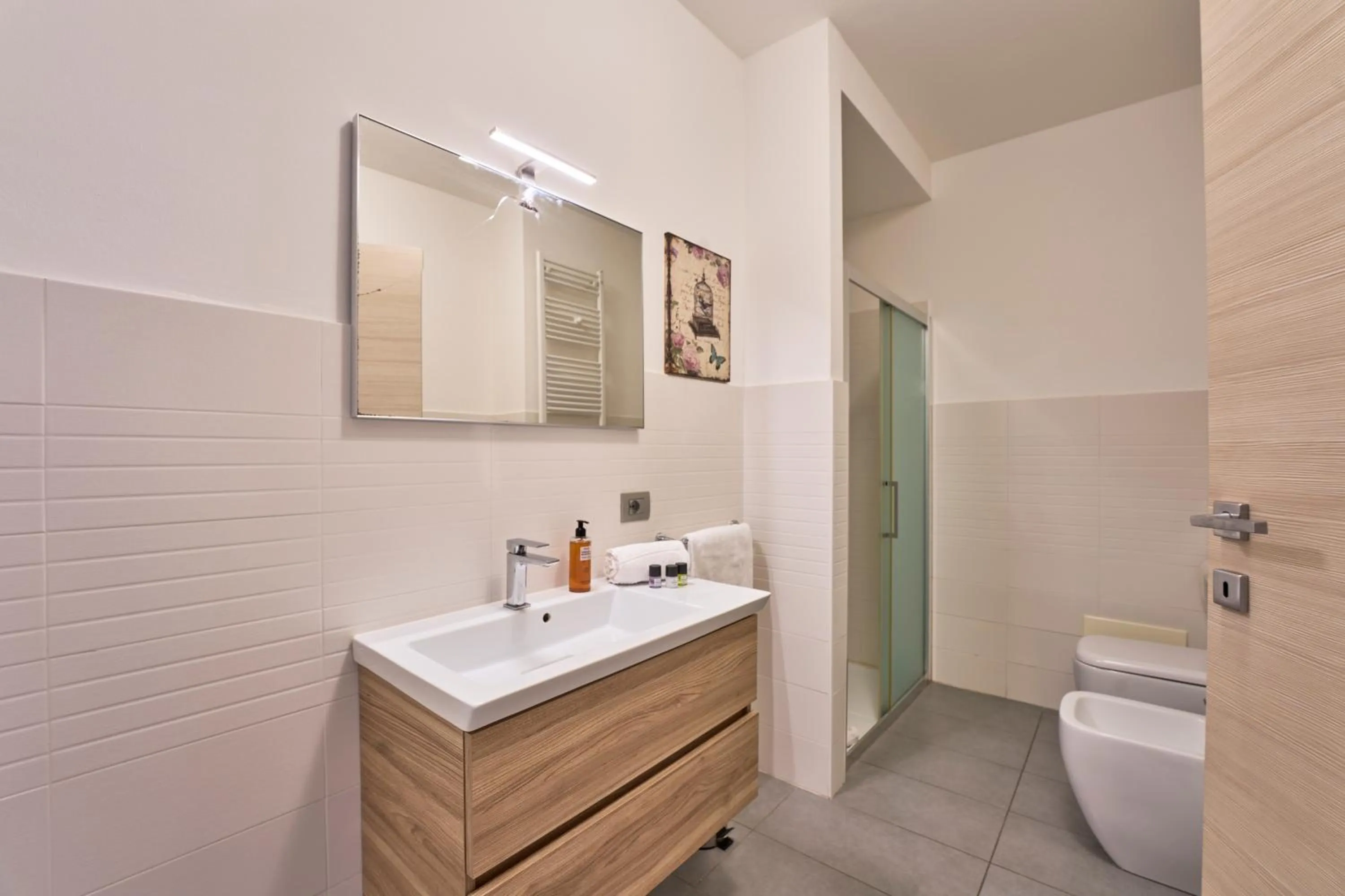 Bathroom in Bellagio Village - Holiday Apartments by the Lake - Seasonal Warm Pool and Sauna