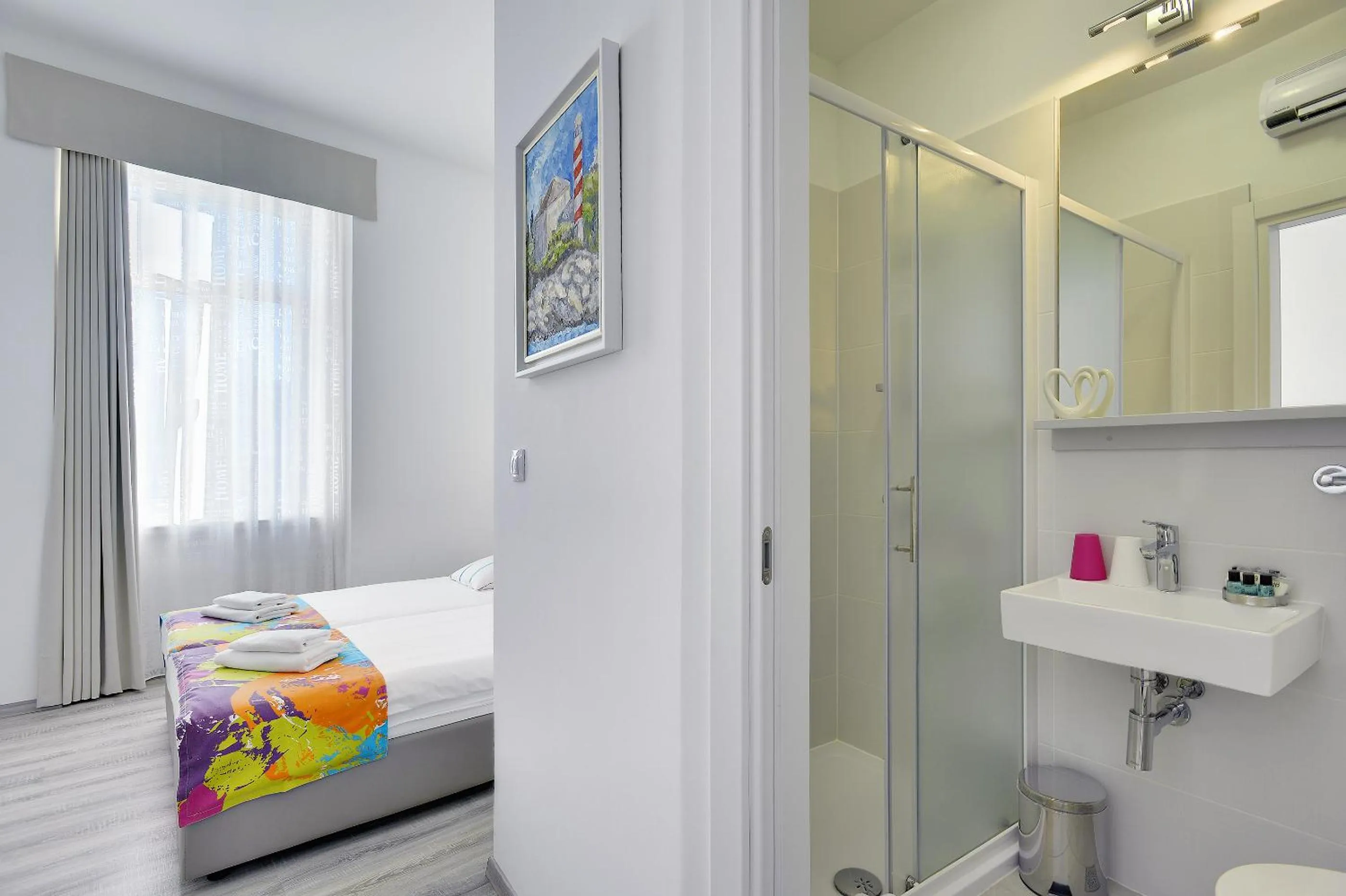 Photo of the whole room, Bed in Boutique Suites Joyce