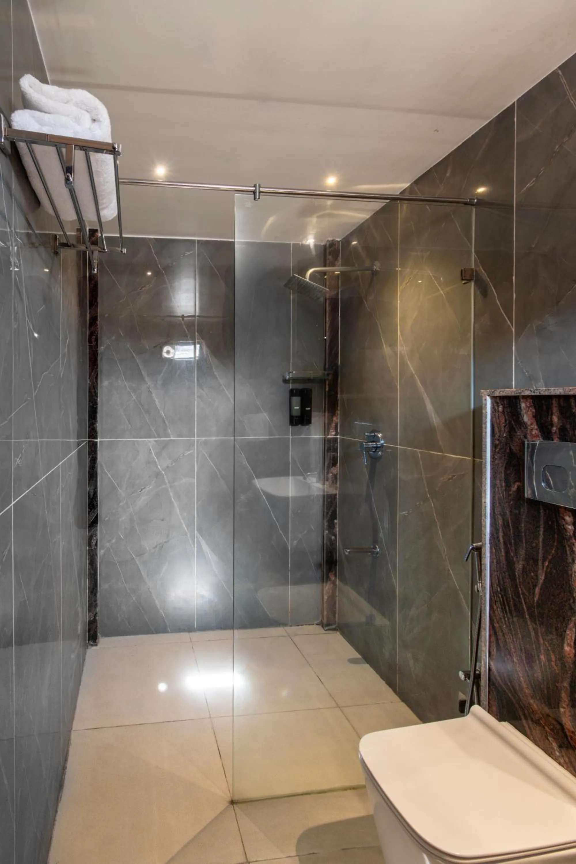 Bathroom in Triton Suites By Bestinn Leisure