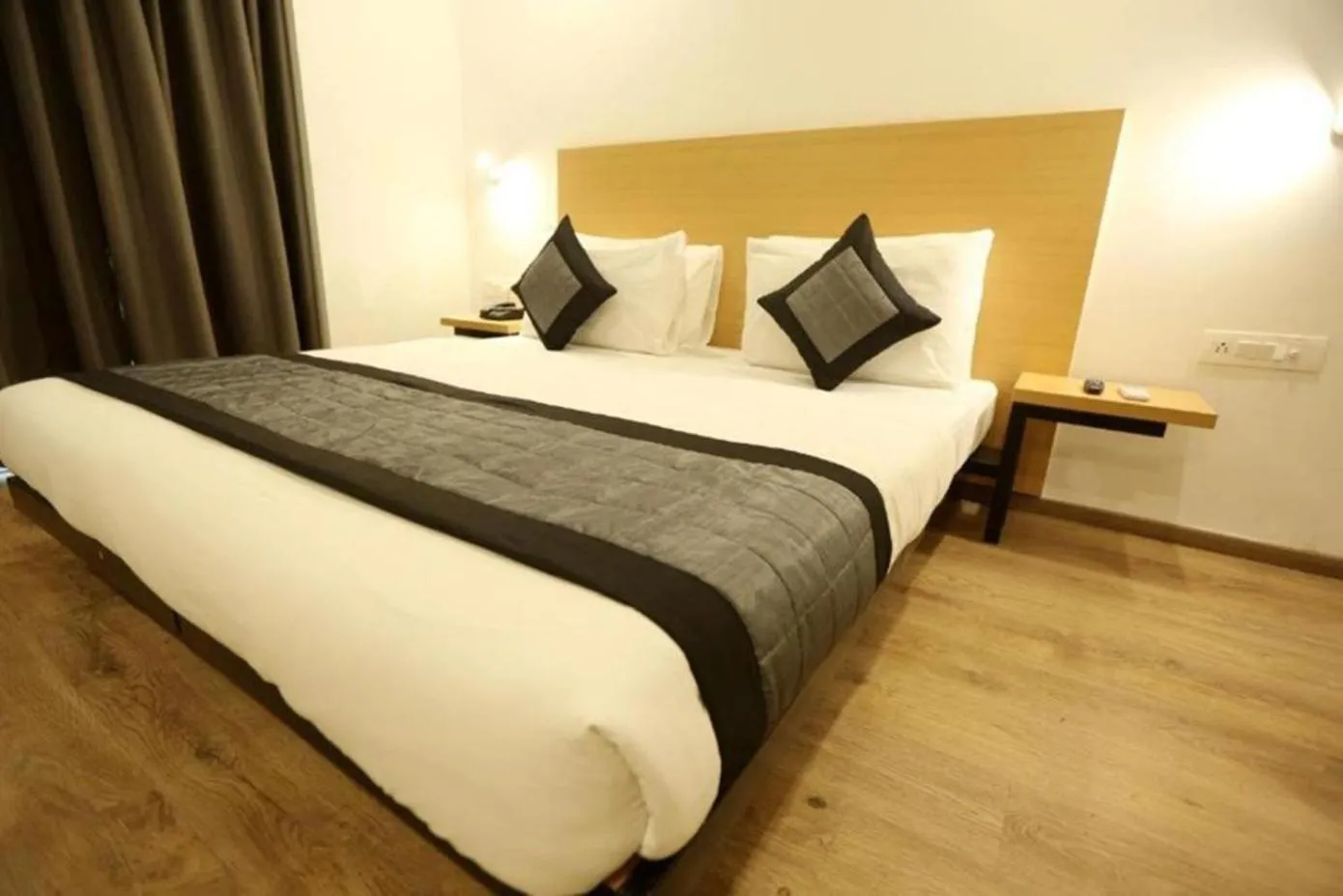 Bed in The Roseman Hotel & Suites