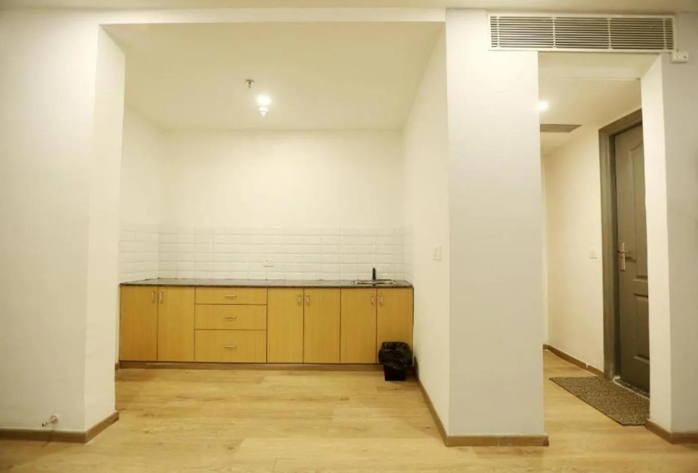 Kitchen or kitchenette in The Roseman Hotel & Suites