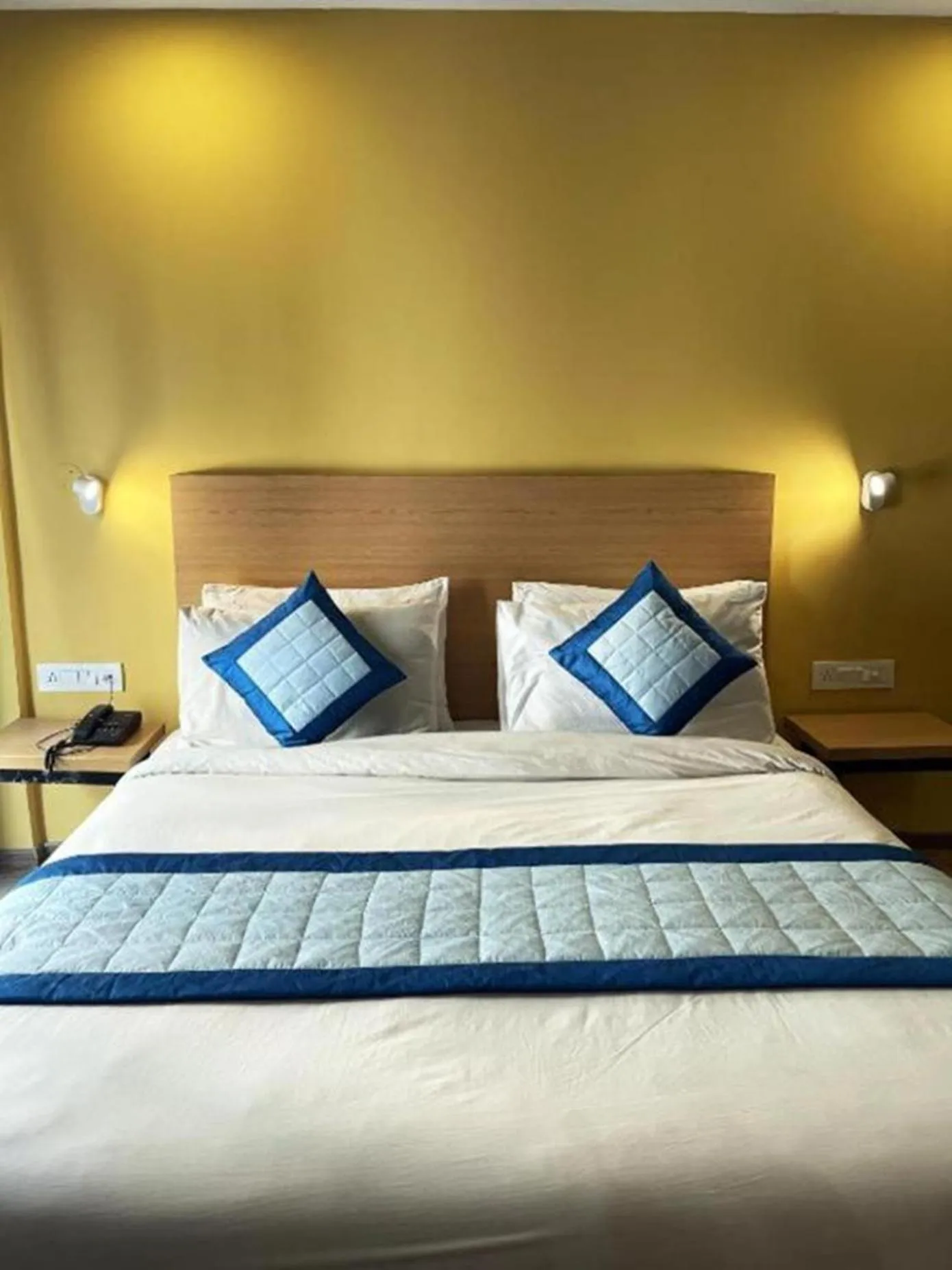 Bed in The Roseman Hotel & Suites